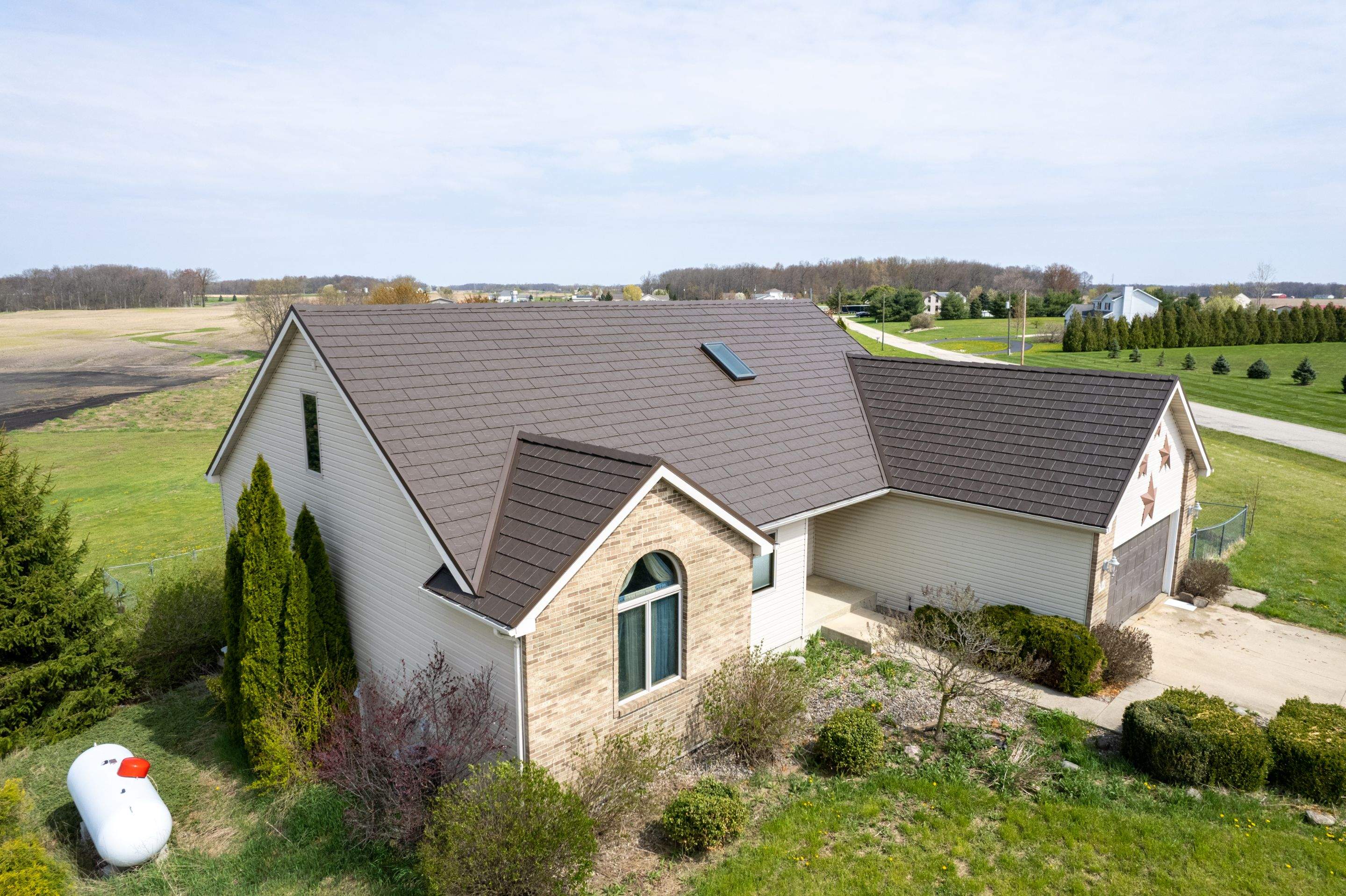 Slate Profile Metal Shingle Roof Replacement After Storm Damage in Columbia City, Indiana by 4Ever Metal Roofing