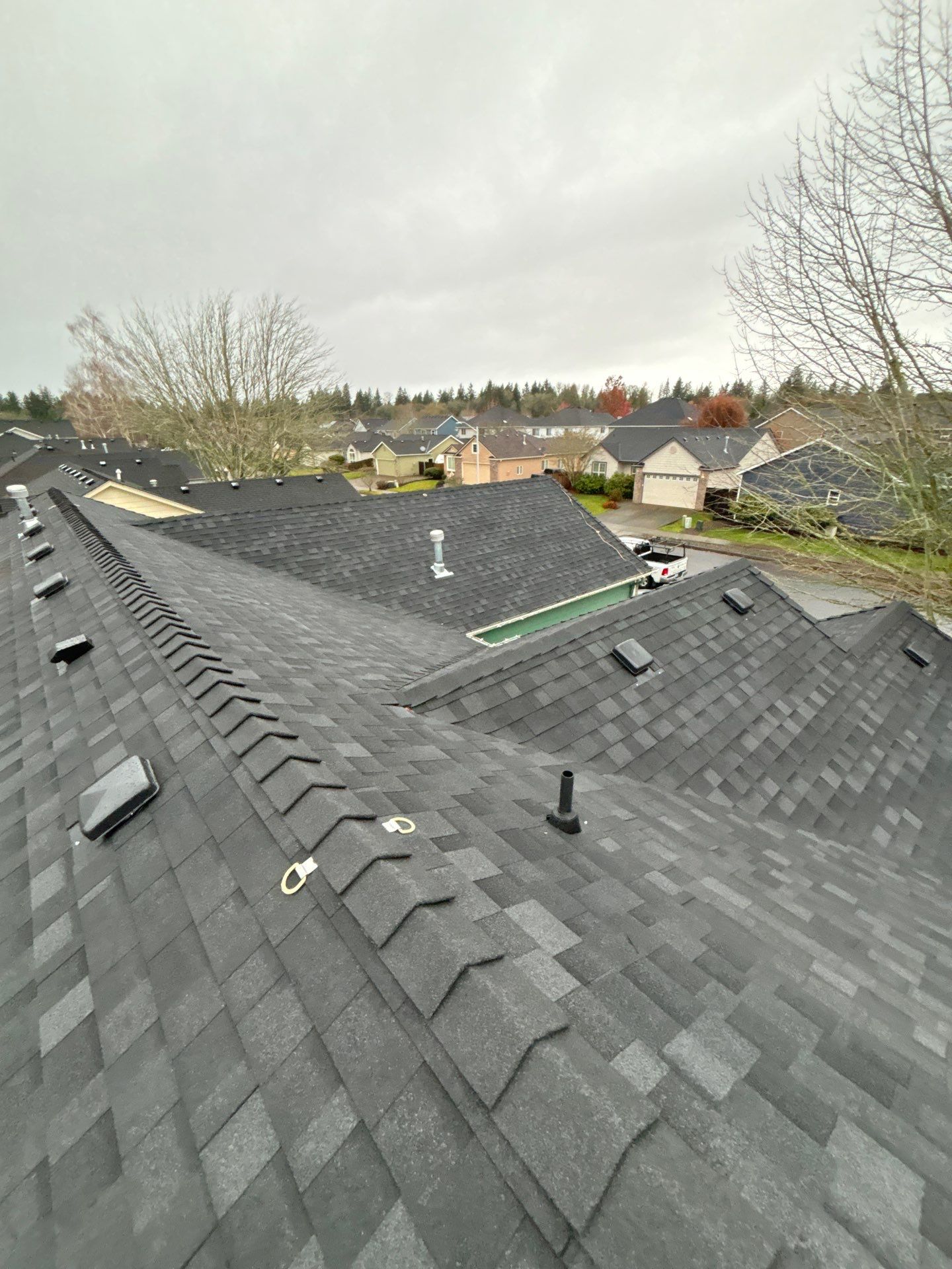 Residential Roofing Installation using IKO Dynasty (Color: Granite Black) by Orezona Building & Roofing Company, Inc.