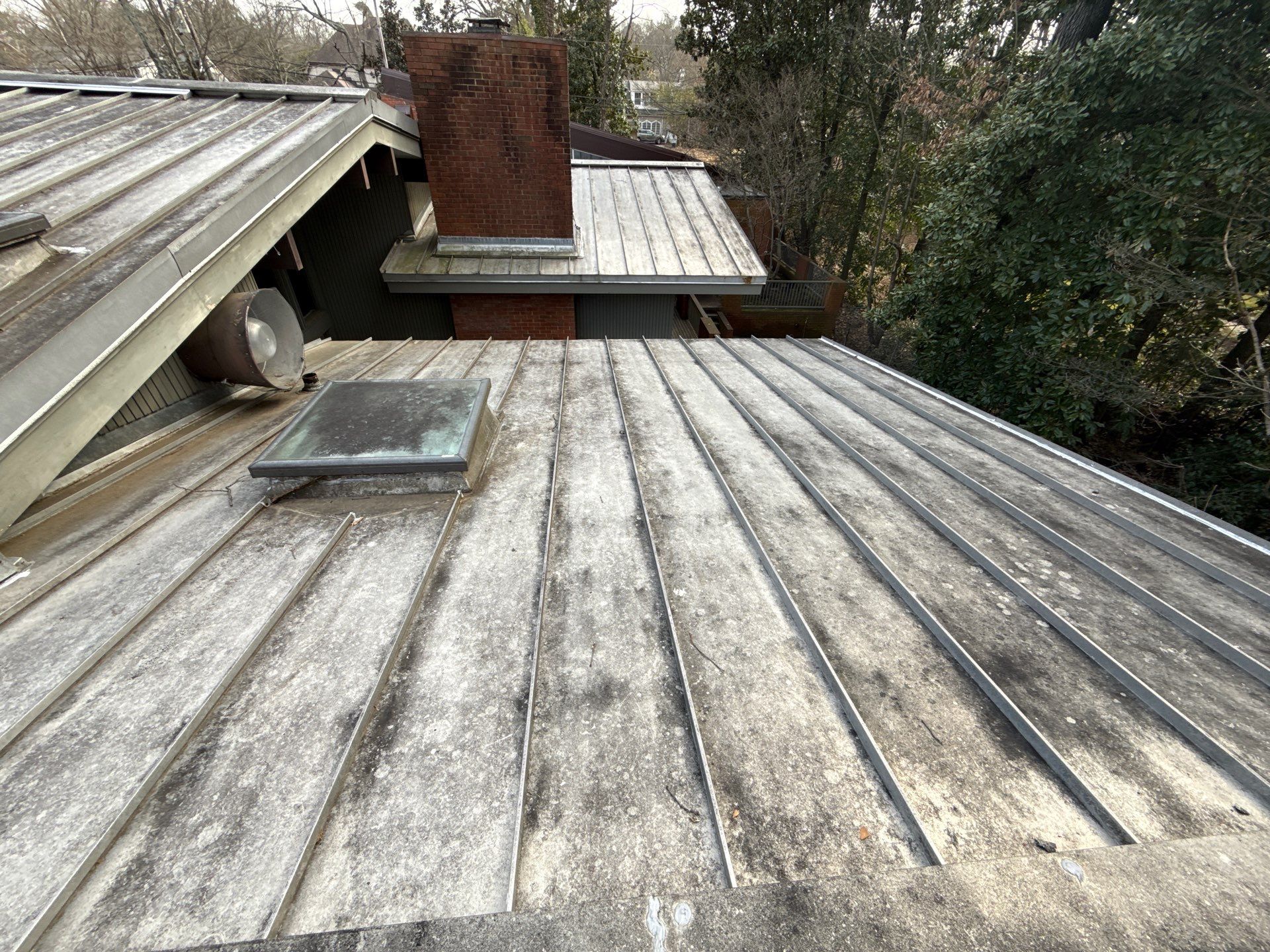 Residential Standing Seam Metal Roof and Membrane Replacement in Memphis by Revival Roofing Services