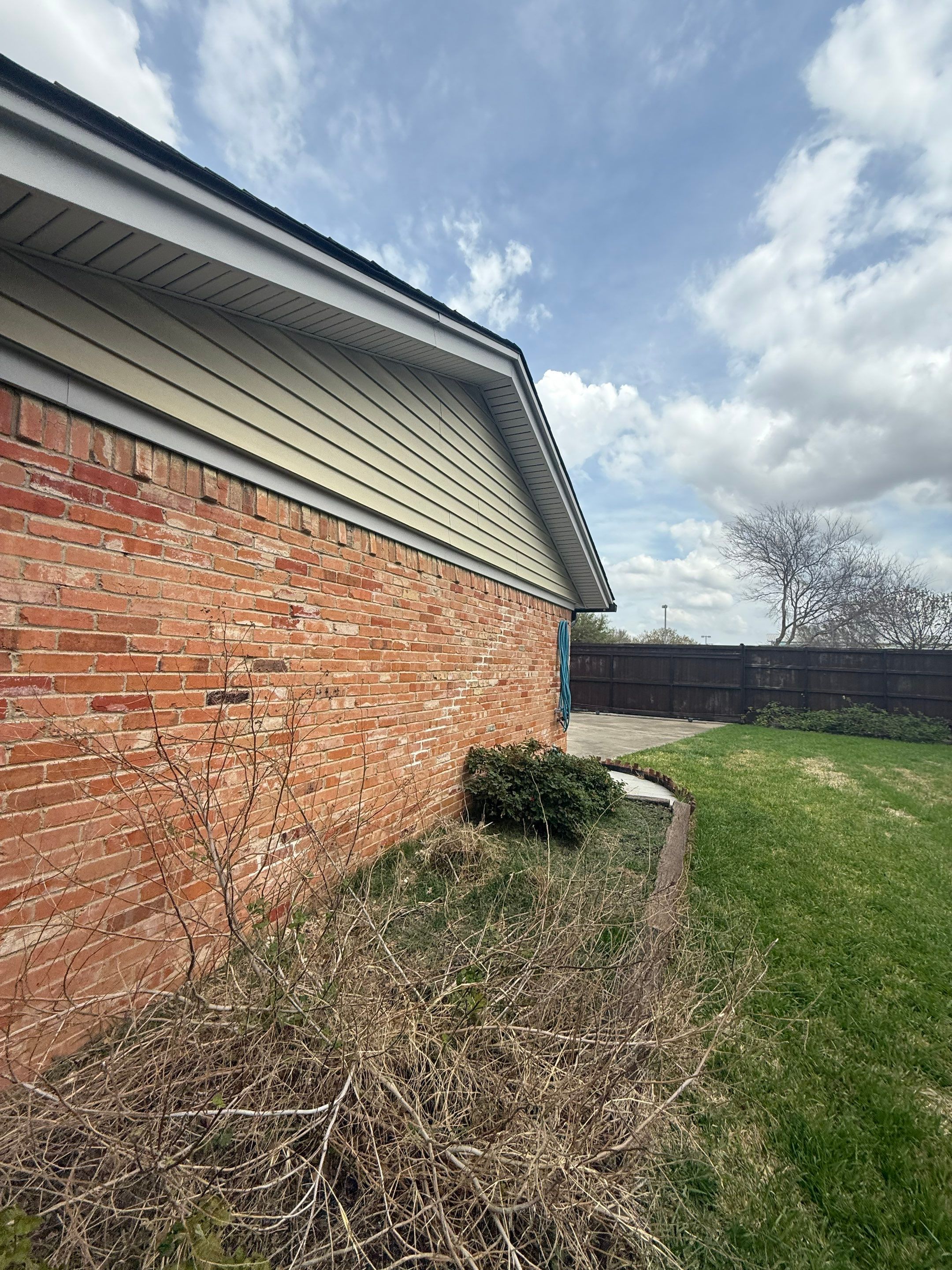 Exterior Home Paint Project with Different Surfaces by SLM General Contractors & Roofing