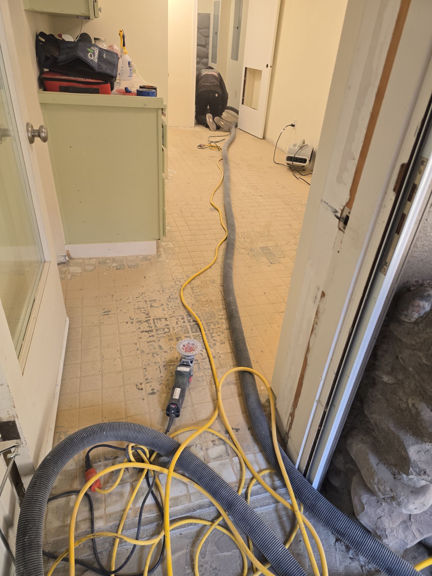 Quartzite Hybrid Flooring Transformation for a Kennewick Utility Room by Croc Coatings, LLC