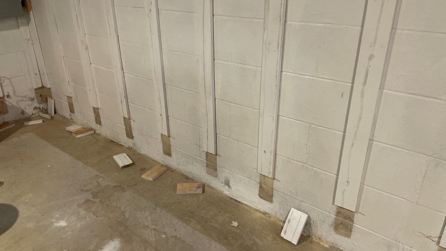 Interior Drain Tile & Buried Discharge in St. Anthony, MN by Waterproofing Northeast