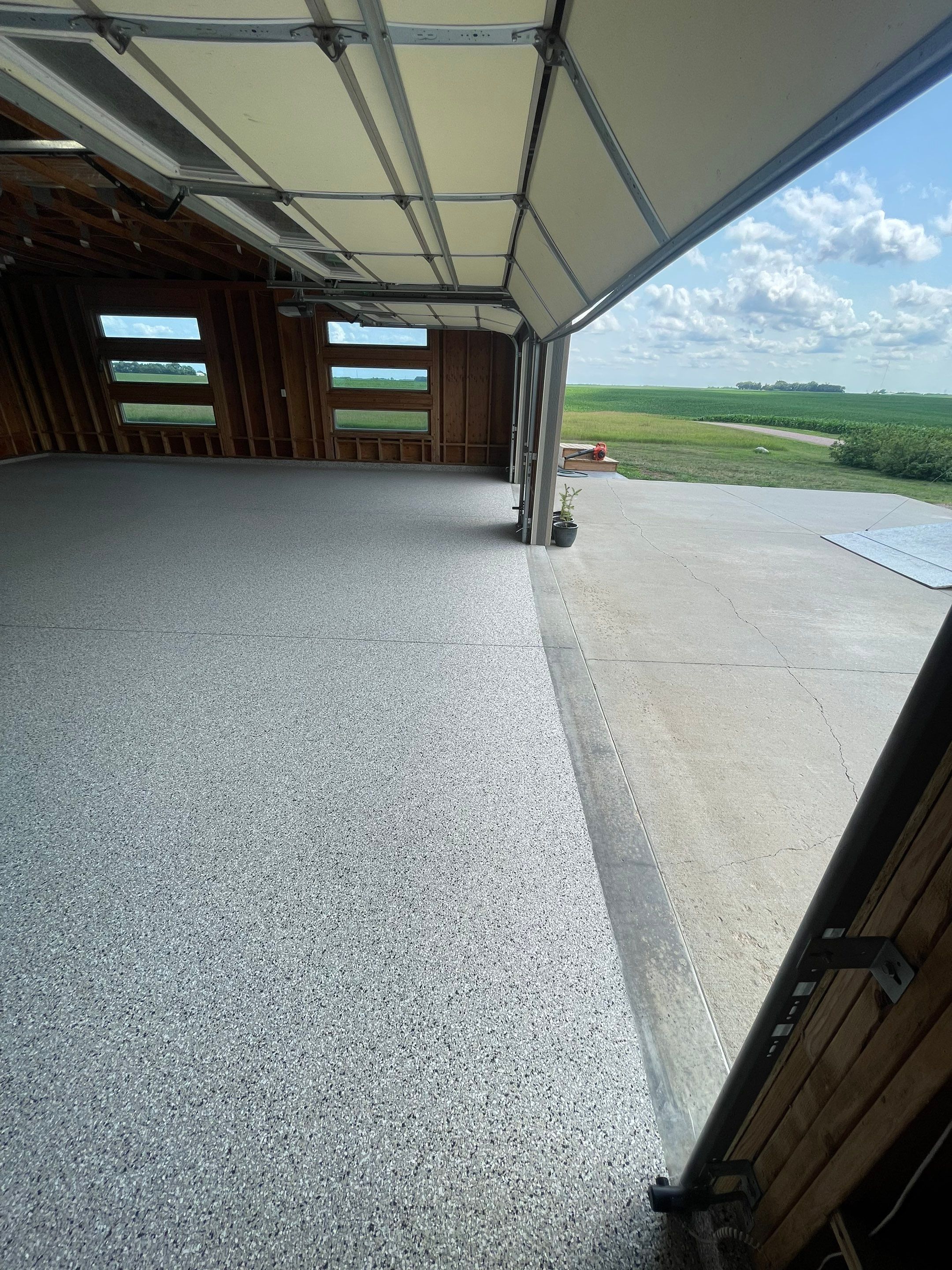 Cabin Fever Coating for Detached Garage in Dell Rapids by Select Painting, Coatings & Garage Cabinets