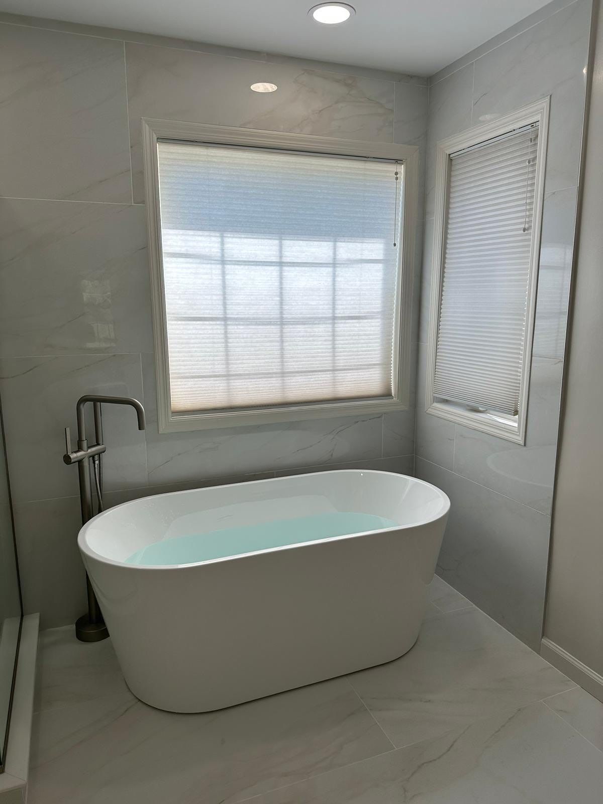 Bathroom Remodel using Tile by Home Concepts Construction
