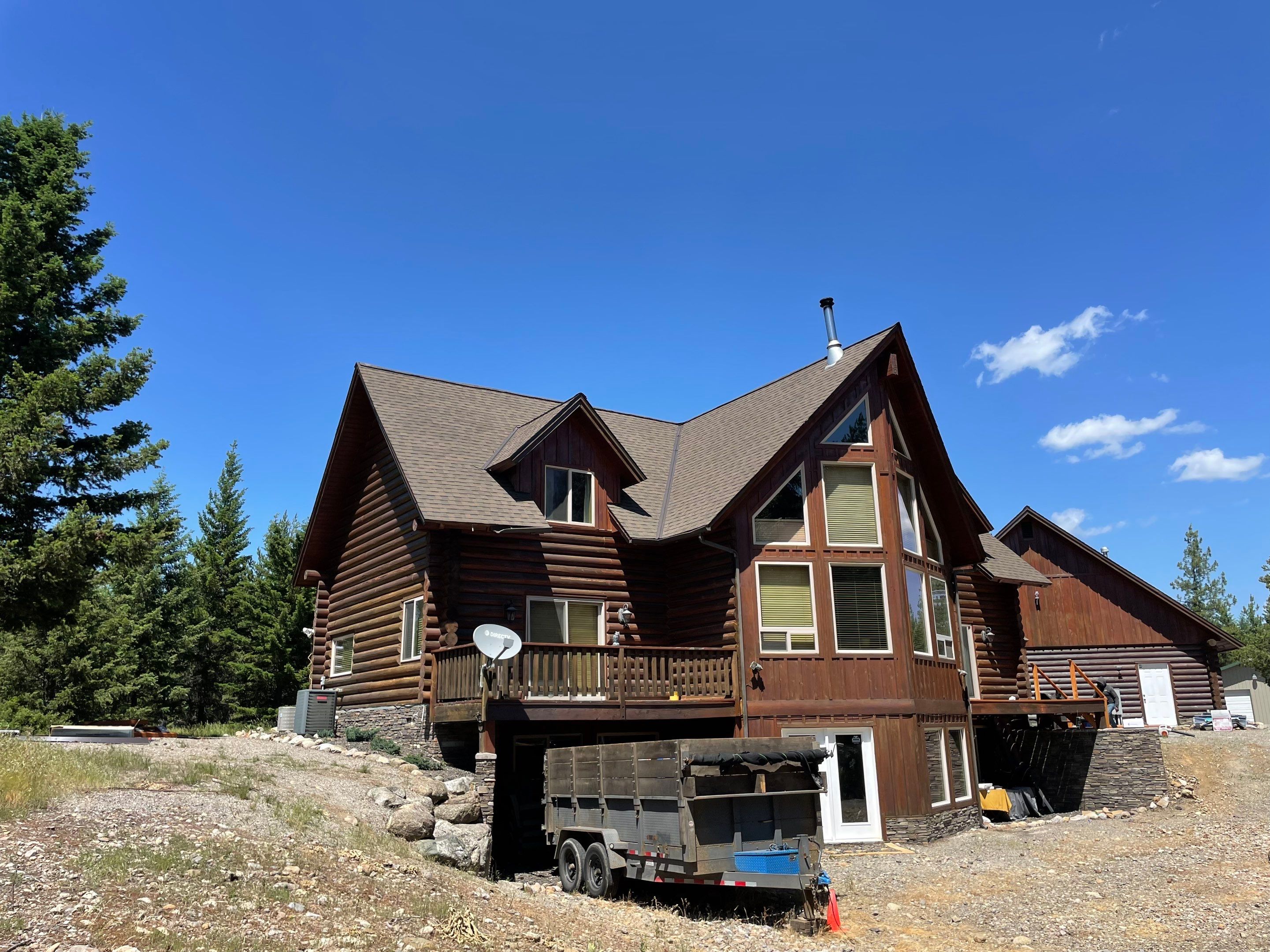 Architectural Shingle Roof Installation for Spirit Lake Log Home Coeur D'Alene Drive Spirit Lake, Idaho, 83869 (SECTION A) PARTIAL ROOF REPLACEMENT - CertainTeed 50 Year Material Guarantee - CertainTeed Workmanship Guarantee: 30 Years - CertainTeed Warranty Transfer Period: 20 Years - Certainteed Landmark® Shingle - Heather Blend by Alpine Roofing