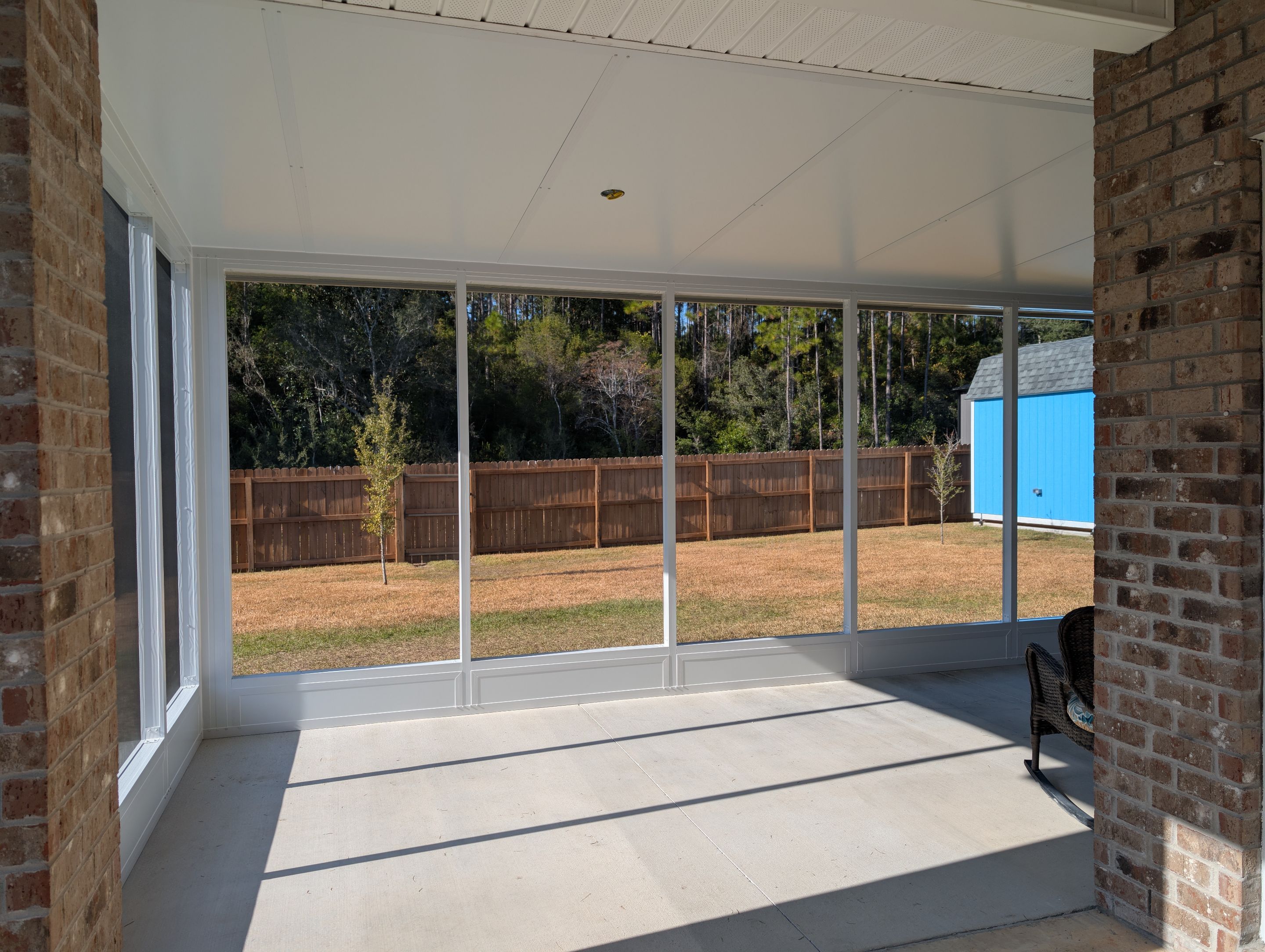 Home addition w/Vinyl 4-Track Windows by Titan Sunrooms