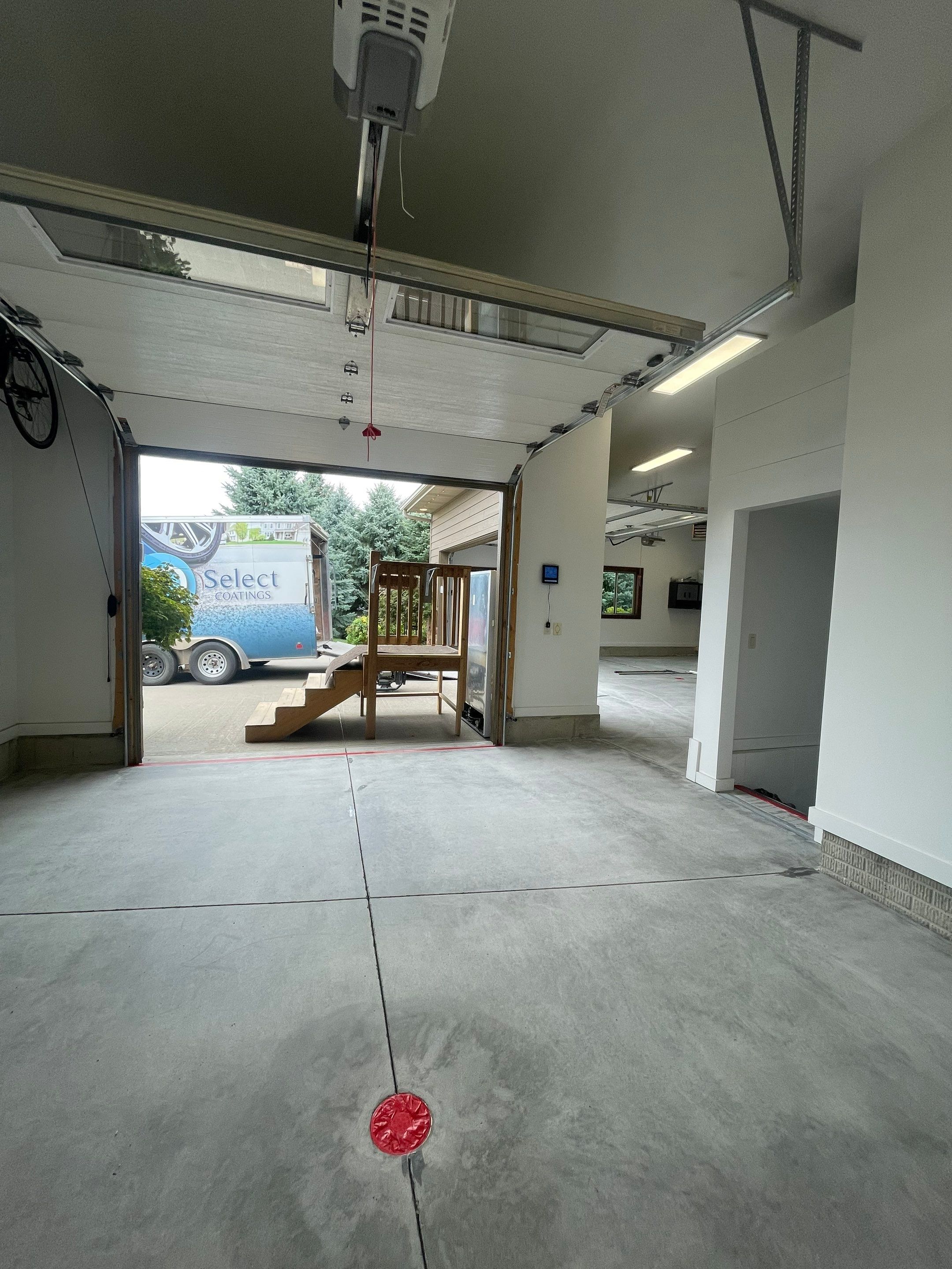 Garage Floor Coating and Domino Flake Finish in Sioux Falls by Select Painting, Coatings & Garage Cabinets