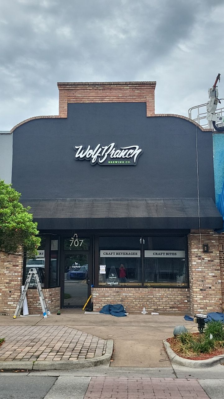 Channel Letters and Blade Sign for Wolf Branch Brewing by SignCrafters