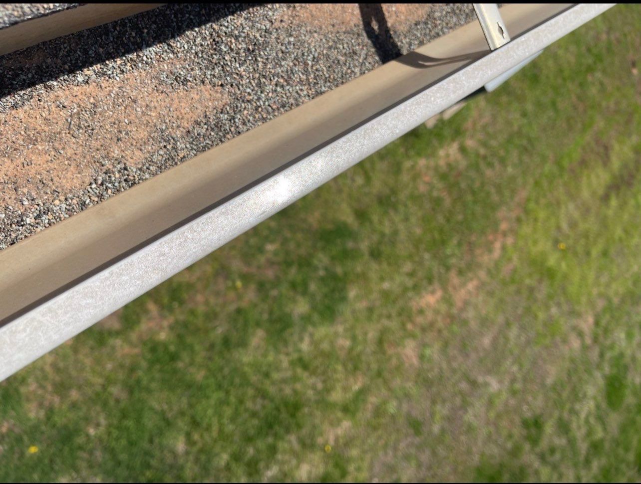 Hail Damage on a Roofing System by Icon Roofing And Construction 