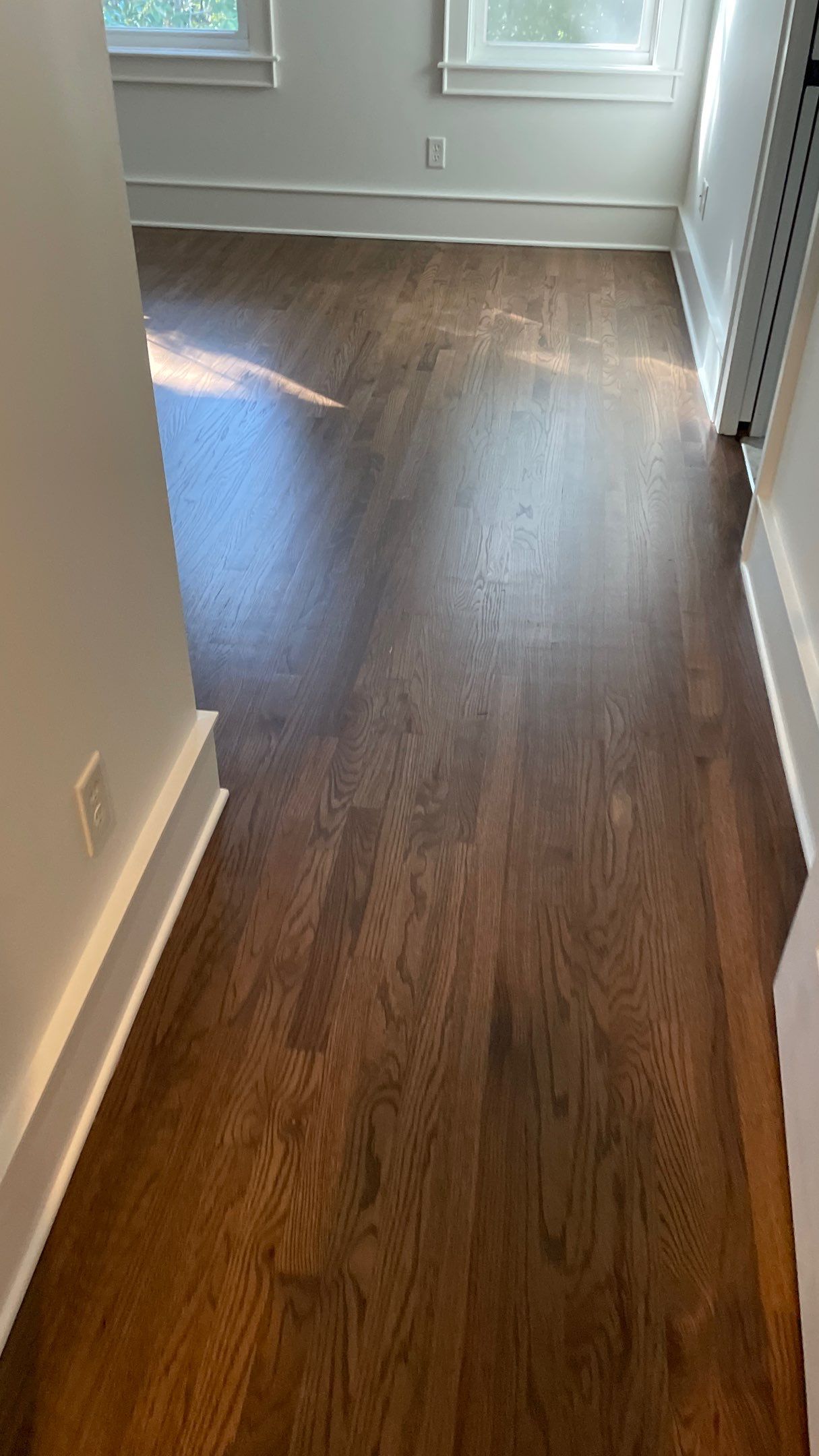 Herringbone Wood Hallway and Rooms by Footprints Floors of Coastal Carolina