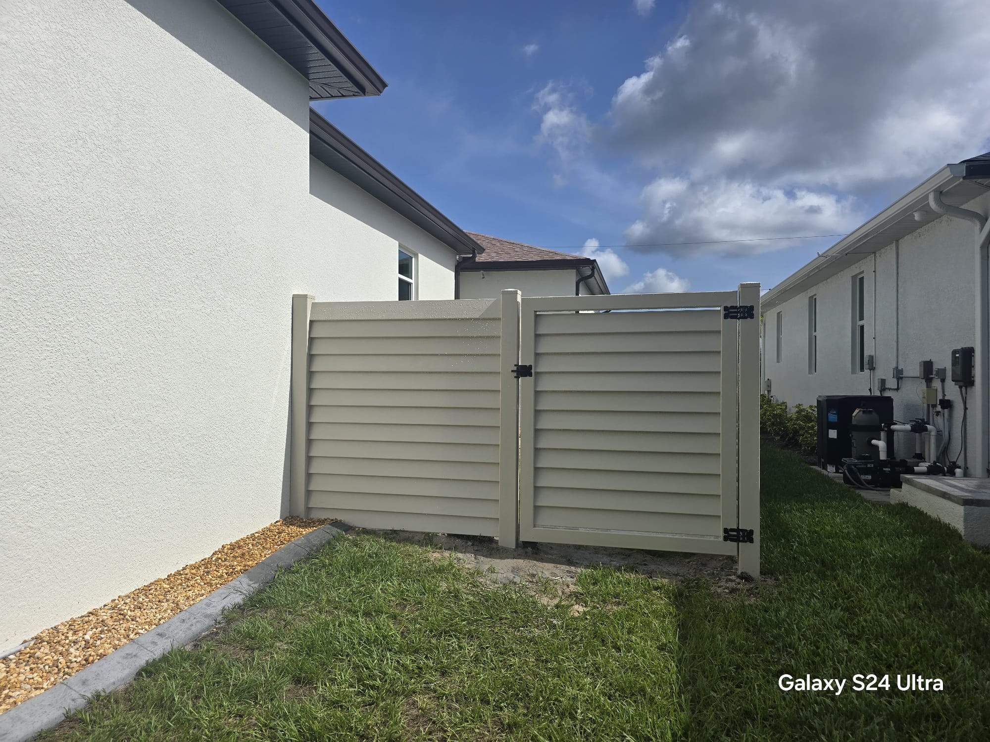 Tan Louvered Vinyl in Port Charlotte by True Fence LLC