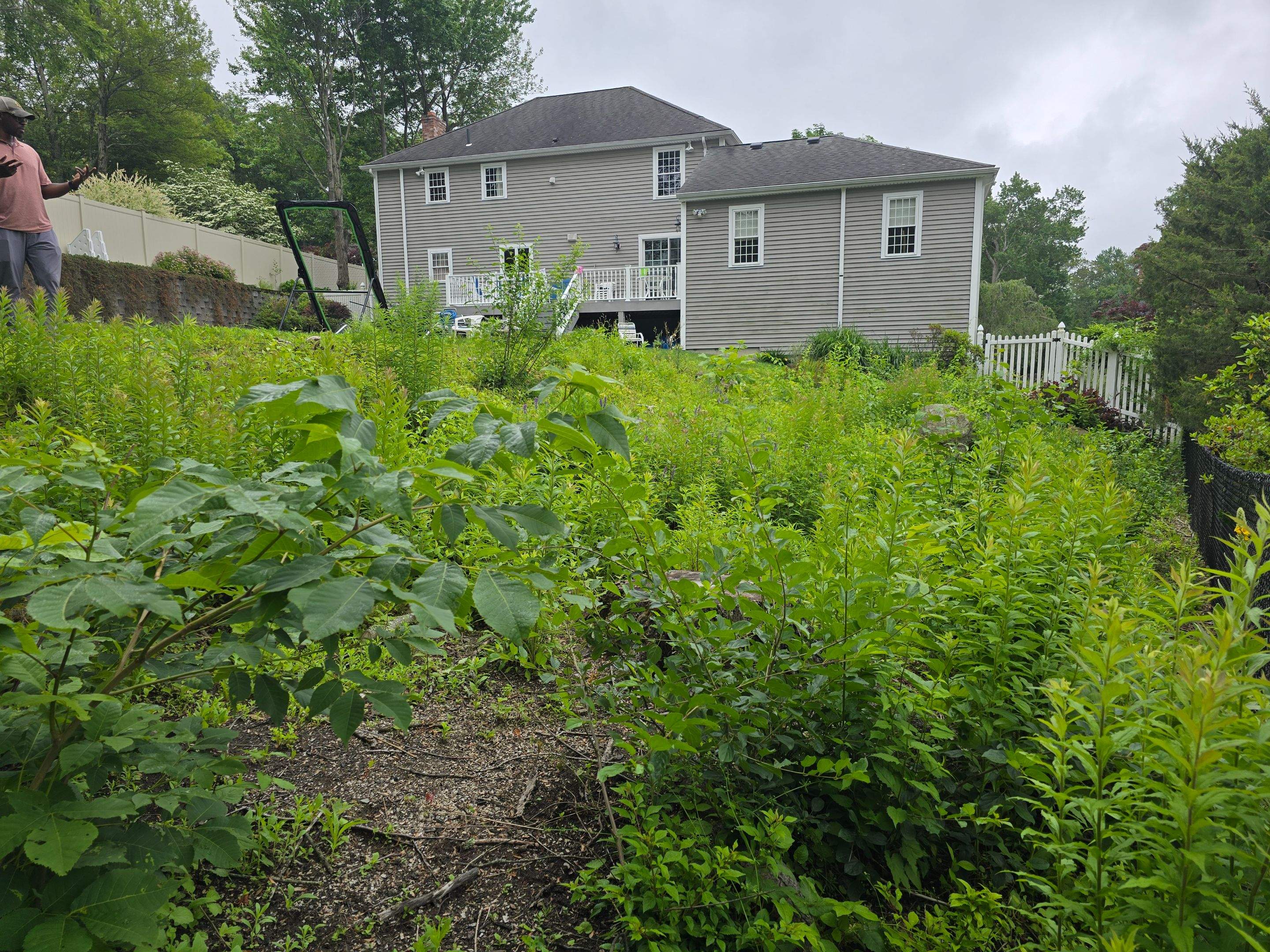Retaining Wall to Level Backyard  by May Property Management 