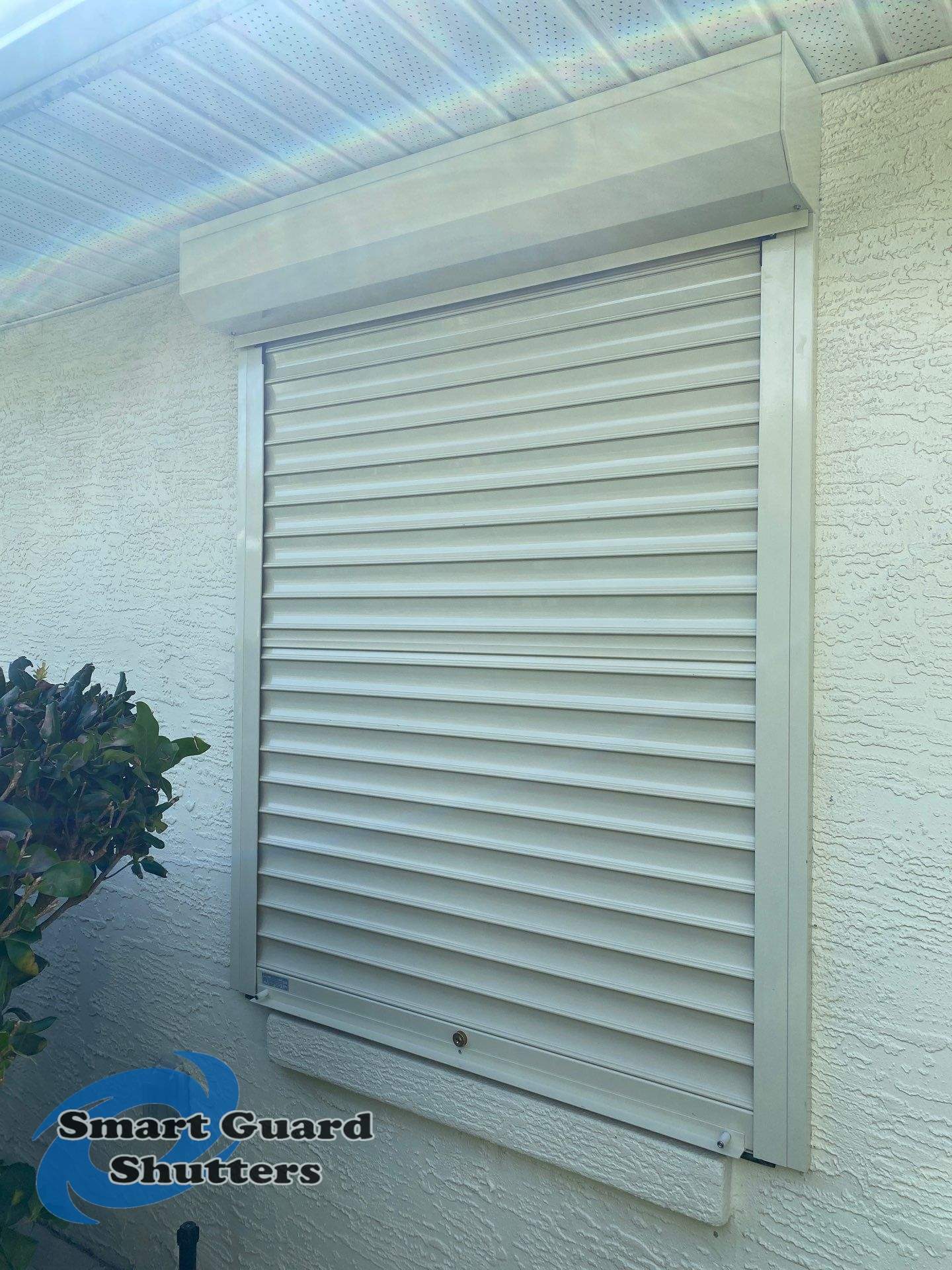 Rolling Shutters in Ivory by Smart Guard Shutters