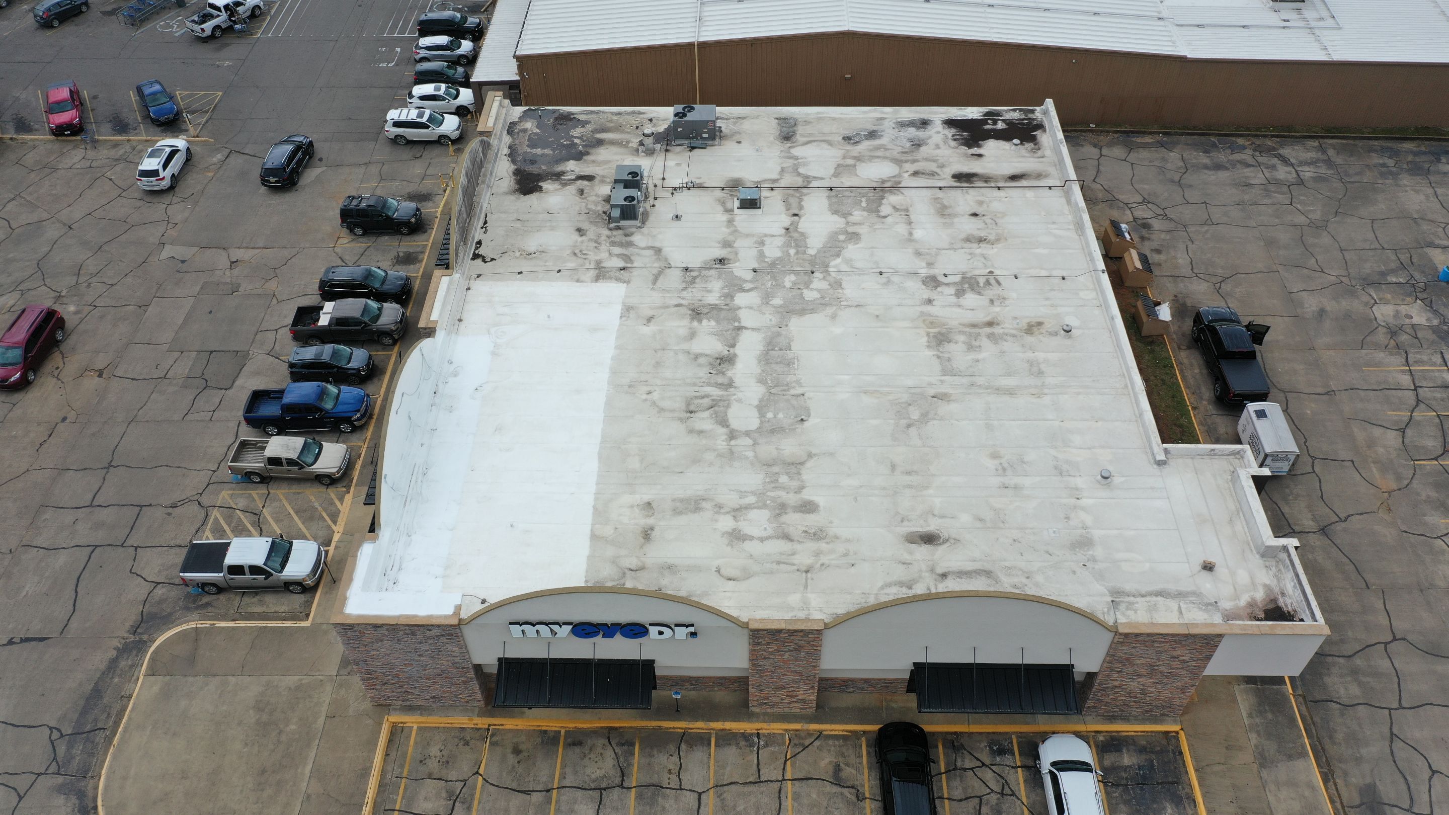 Commercial Roofing Installation using Aldocoat Coatings by Hostetler Roofing