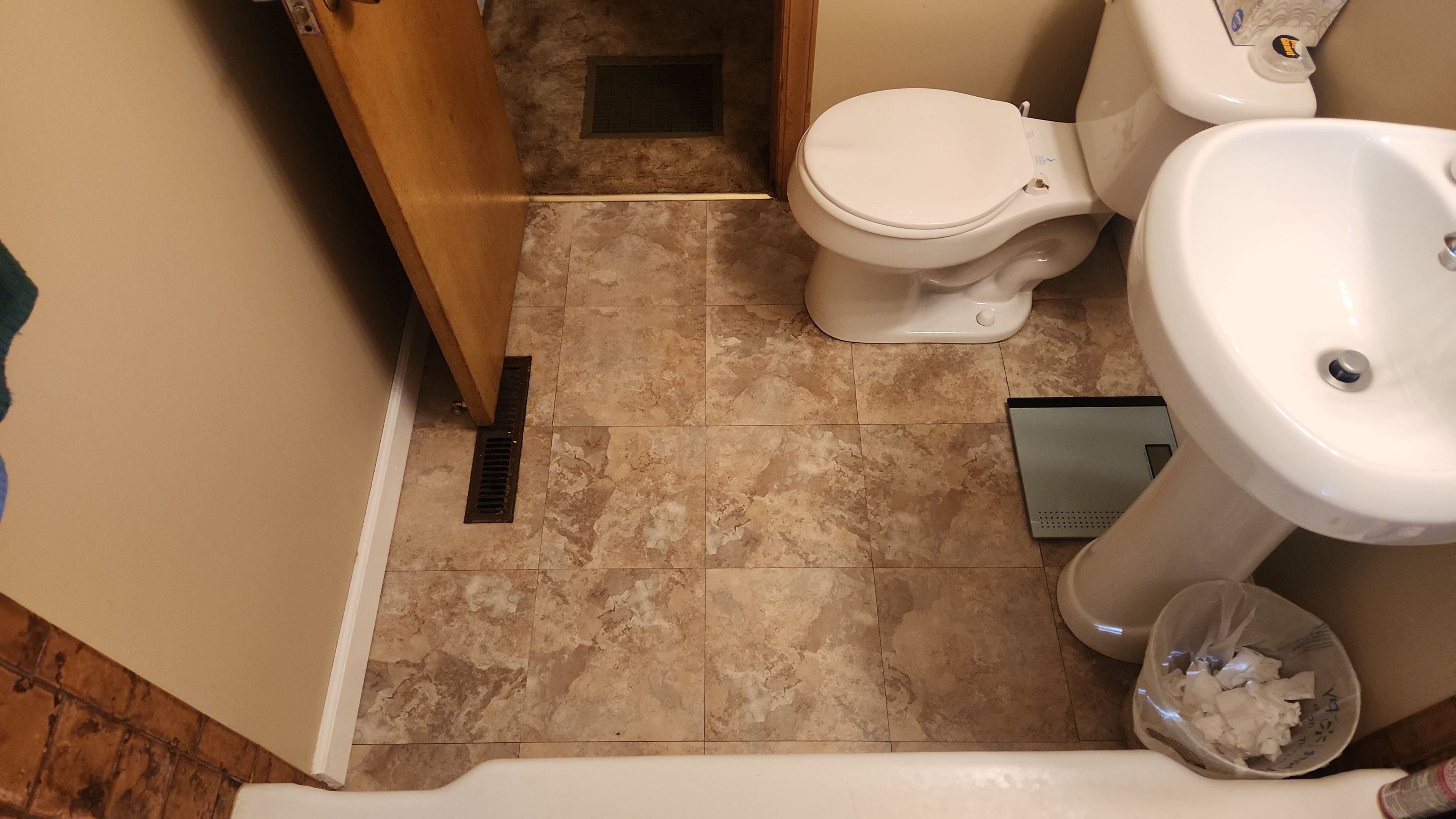 Tiny Bathroom Remodel by The Shower Company