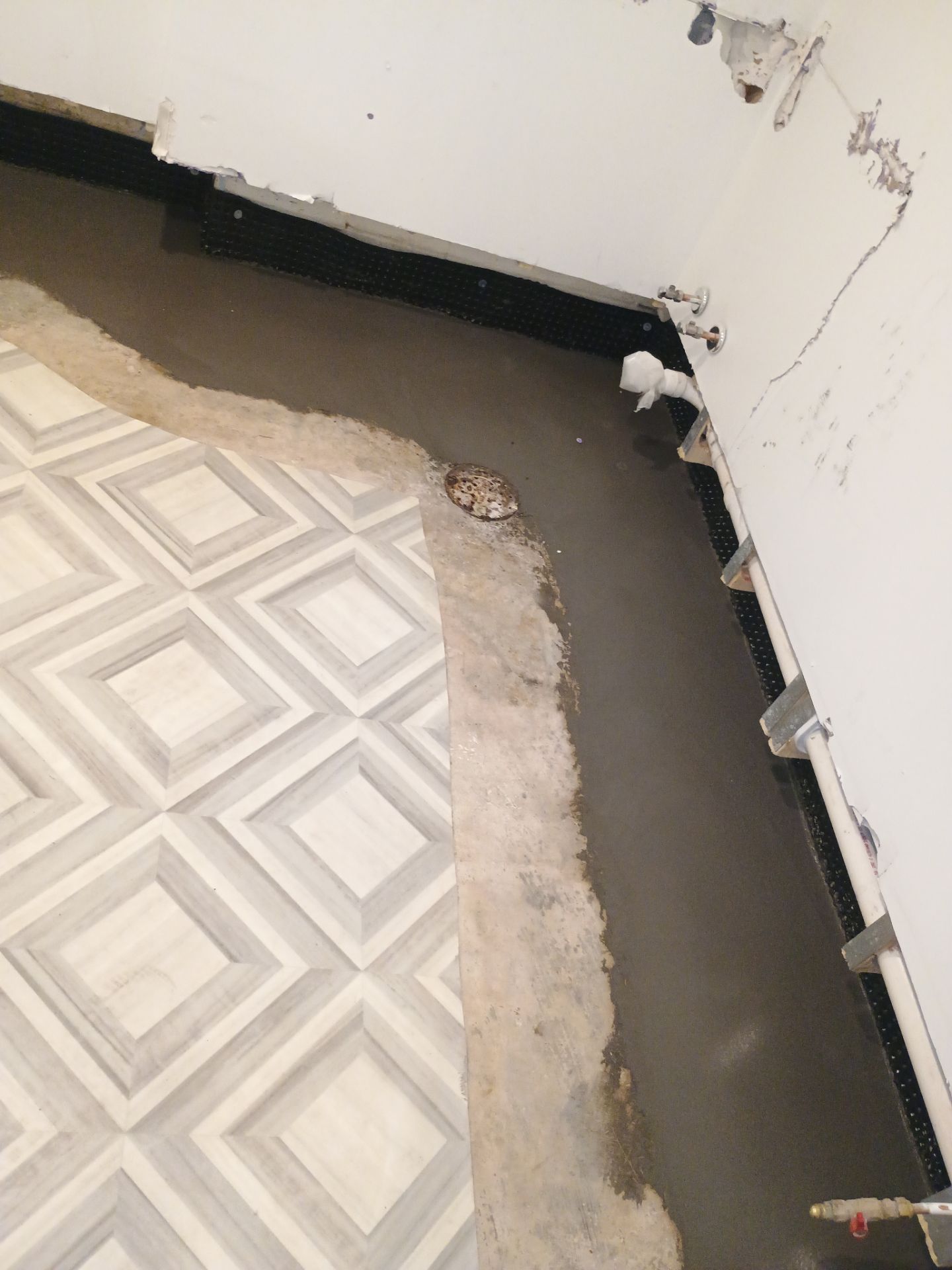 Interior Drain Tile & Buried Discharge in St. Anthony, MN by Waterproofing Northeast