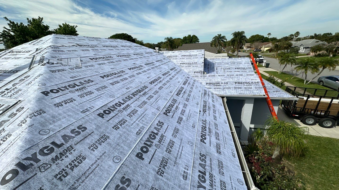 Complete Metal Roof Replacement and Seamless Gutter Installation in Melbourne by Wiedmann Construction & Roofing