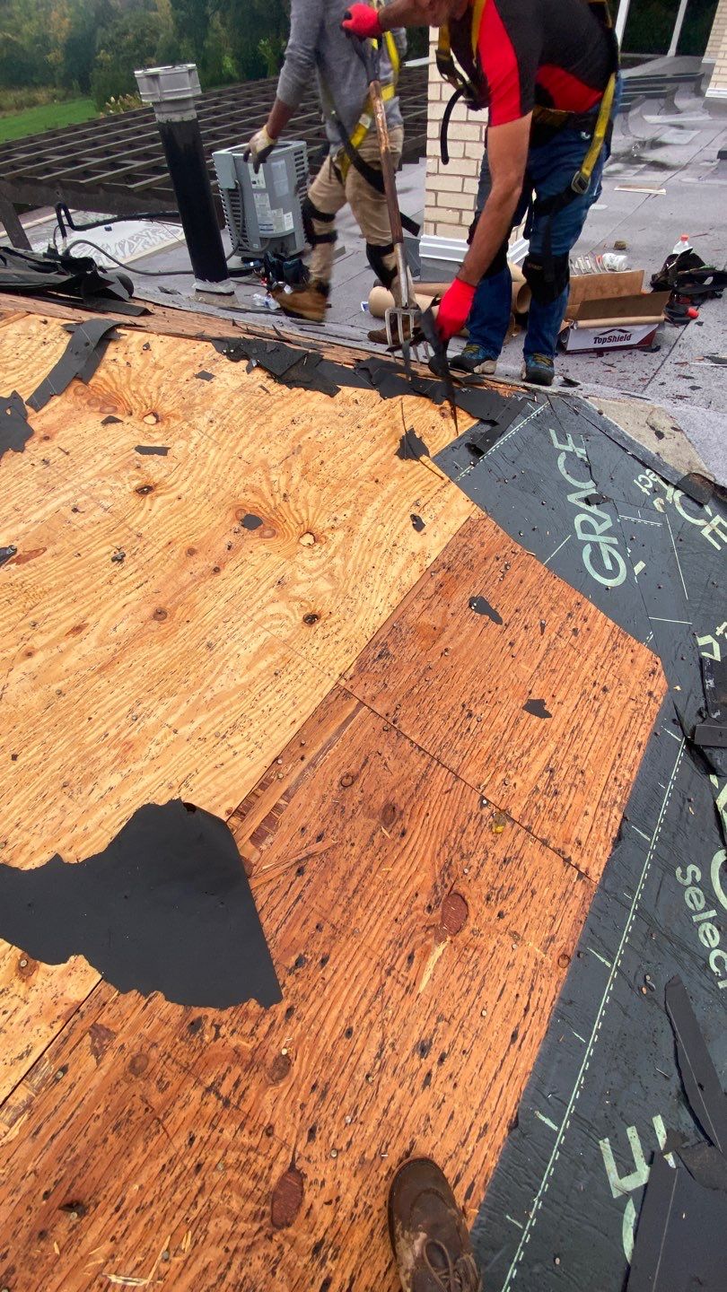 Asphalt Roof Replacement by Custom Installations