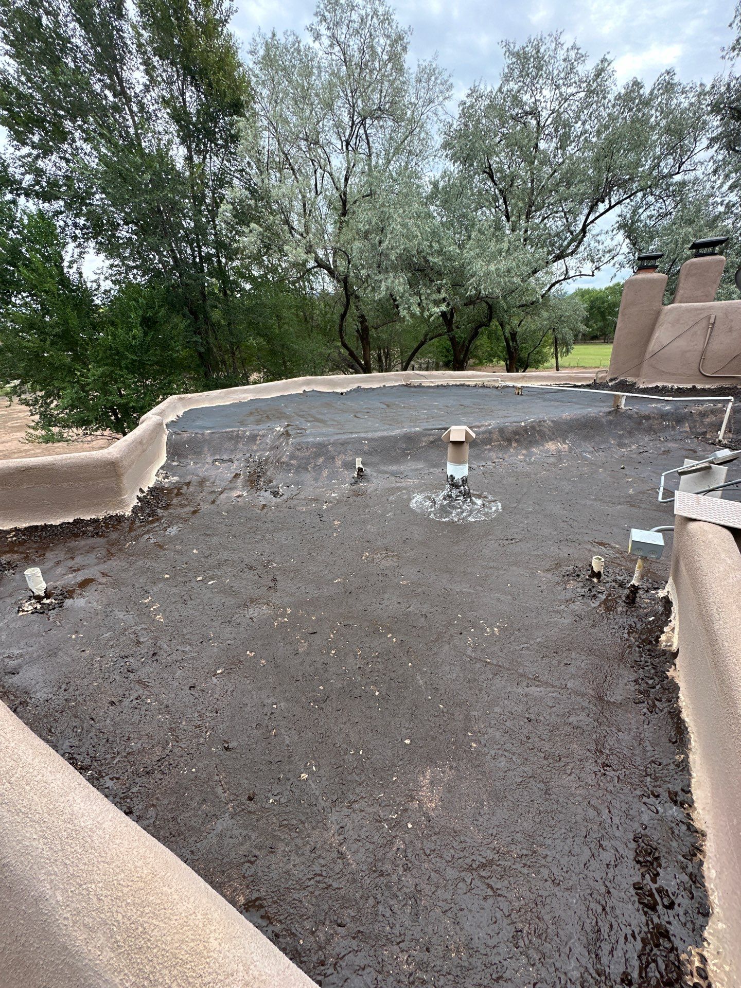 Residential roof application by SPF Services 