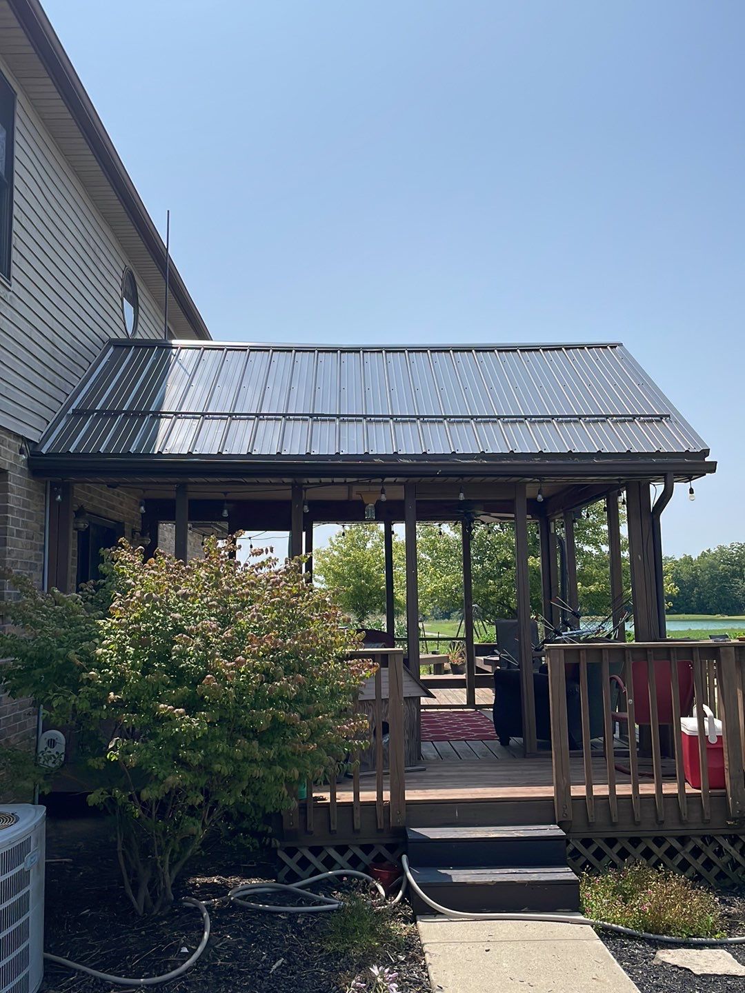 Residential Roofing Installation using Performance Panel Metal - Burnished Slate by RoofX 