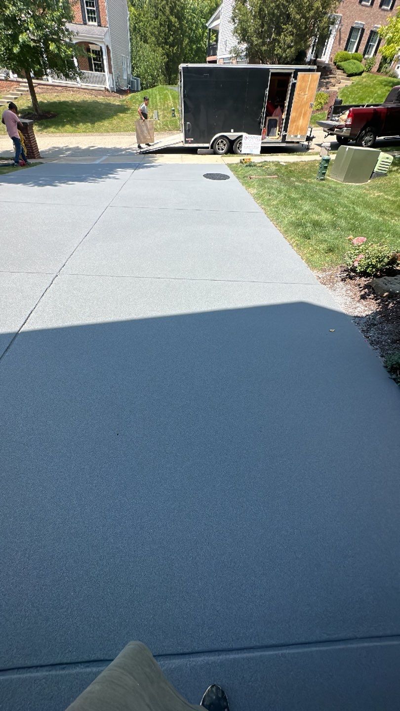 Pool Deck + Driveway + Garage Project in Venetia by Floors in a Day, Inc