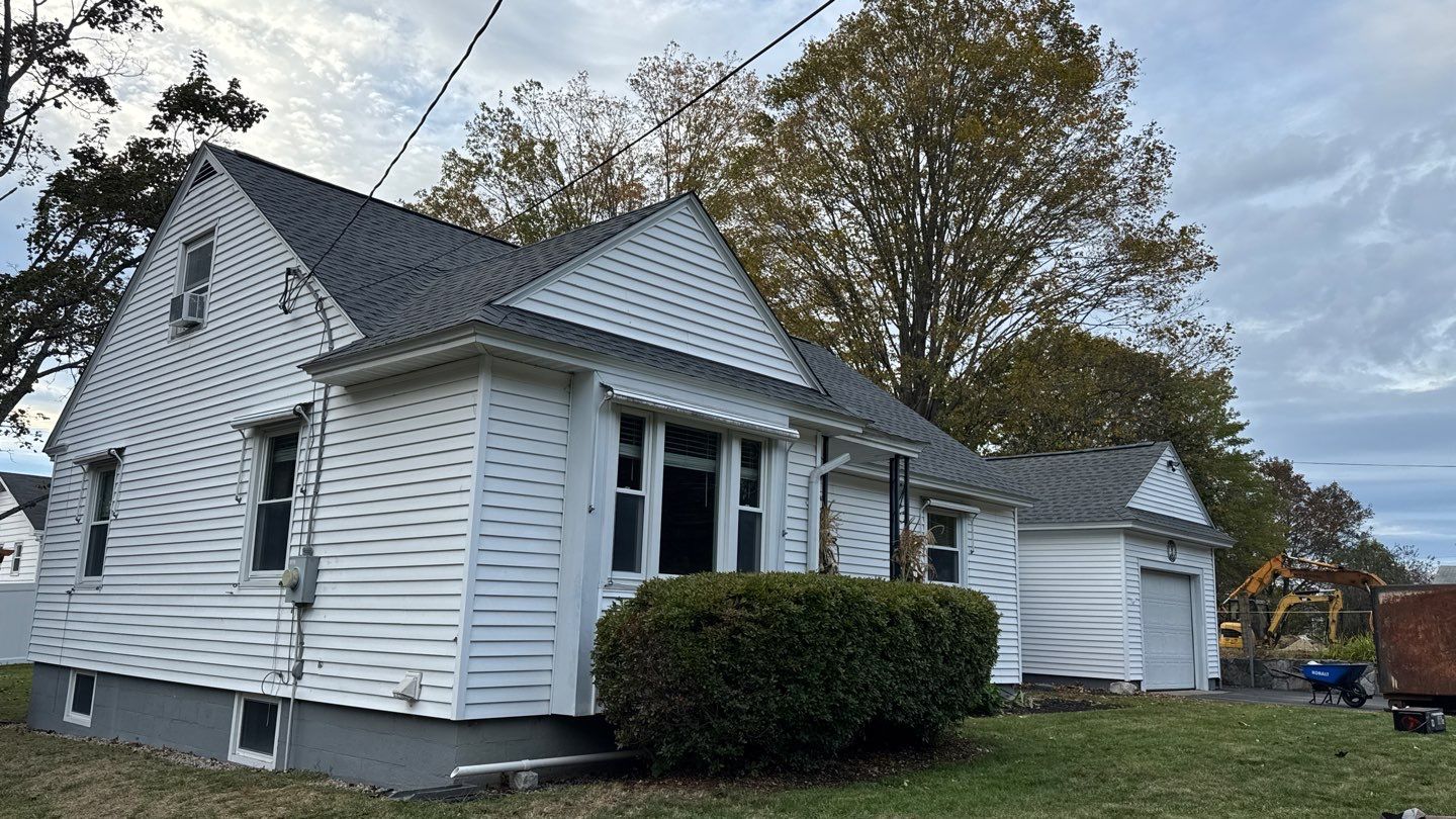 Complete Roof Replacement with GAF Pewter Gray HDZ™ Shingles, VELUX Skylights & New Gutters by Sensible Home Solutions