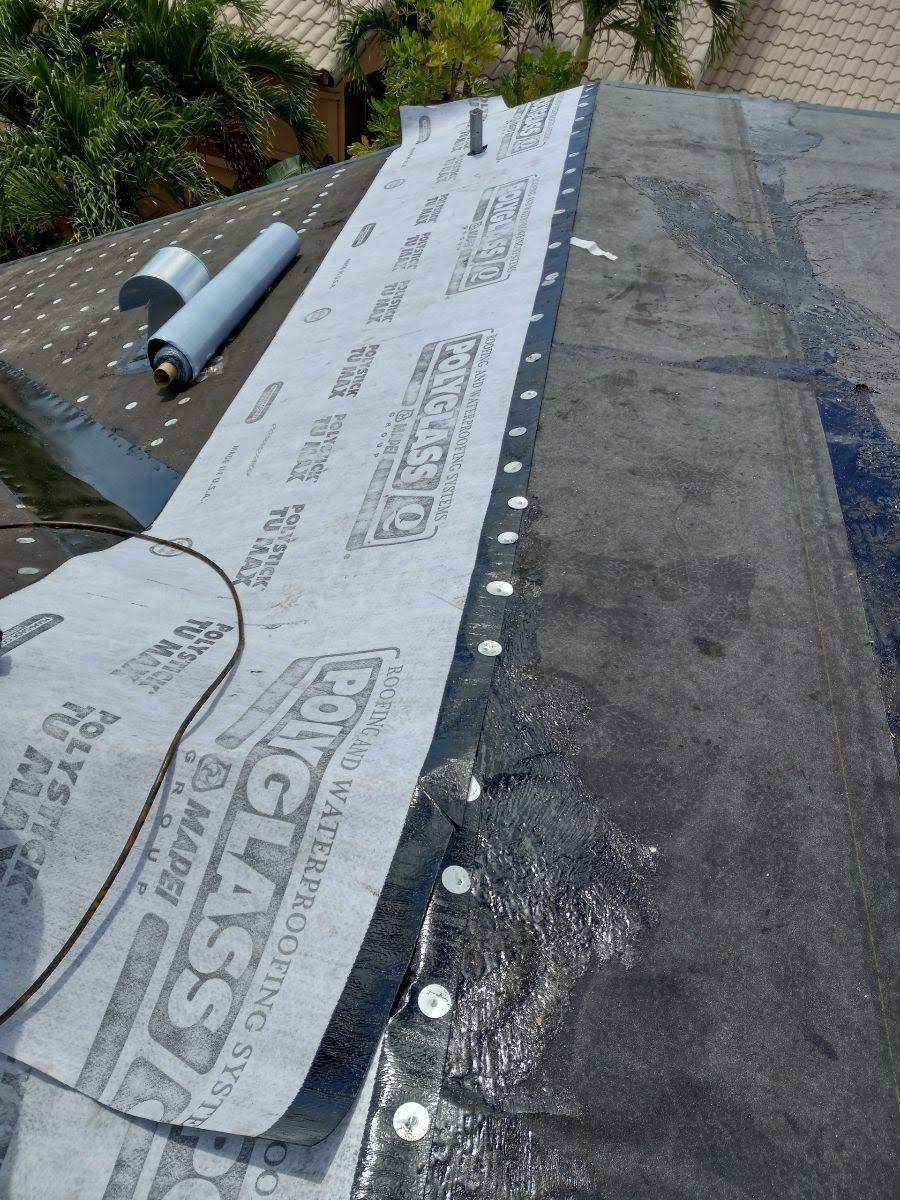 Complete Chimney Rebuild + Tile & Flat Re-Roof  by Morton Roofing, Inc.
