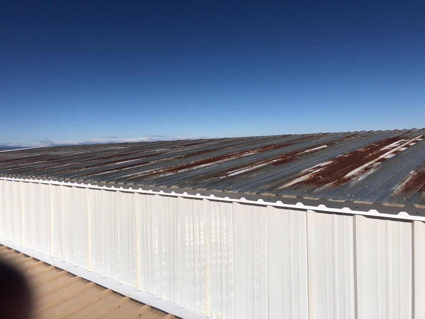 Residential Roofing Installation using Metal roofing by American Roofing & Construction LLC