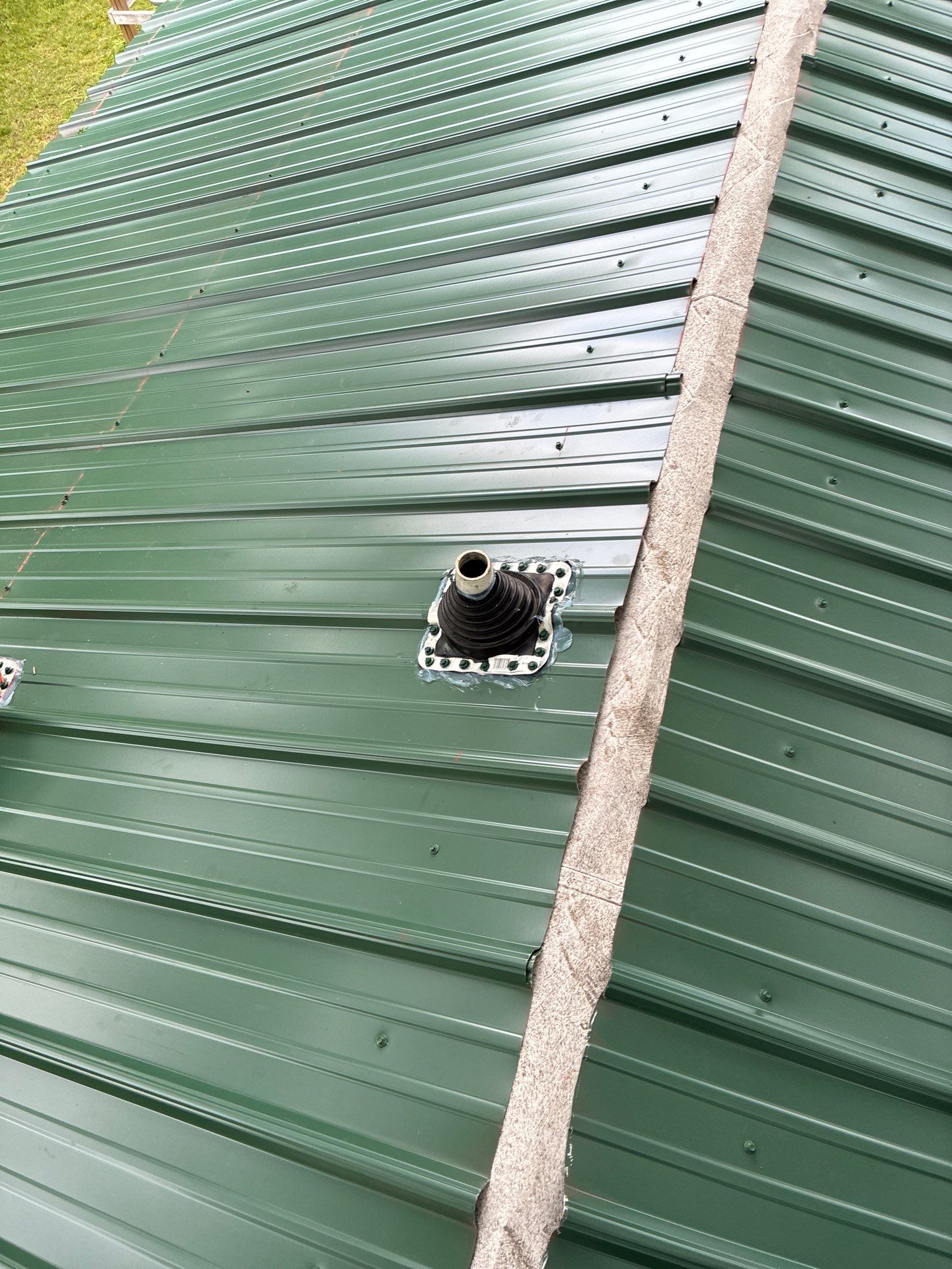 Metal roof installation by In & Out Construction & Remodeling, LLC