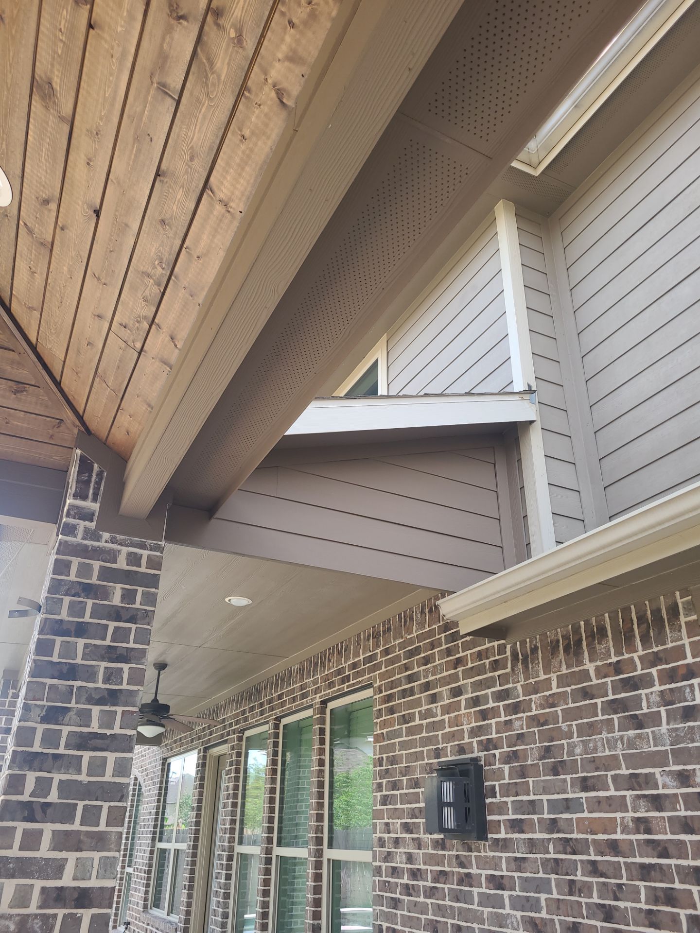Covered Patio and Summer Kitchen in Spring,  TX by SophAlx LLC