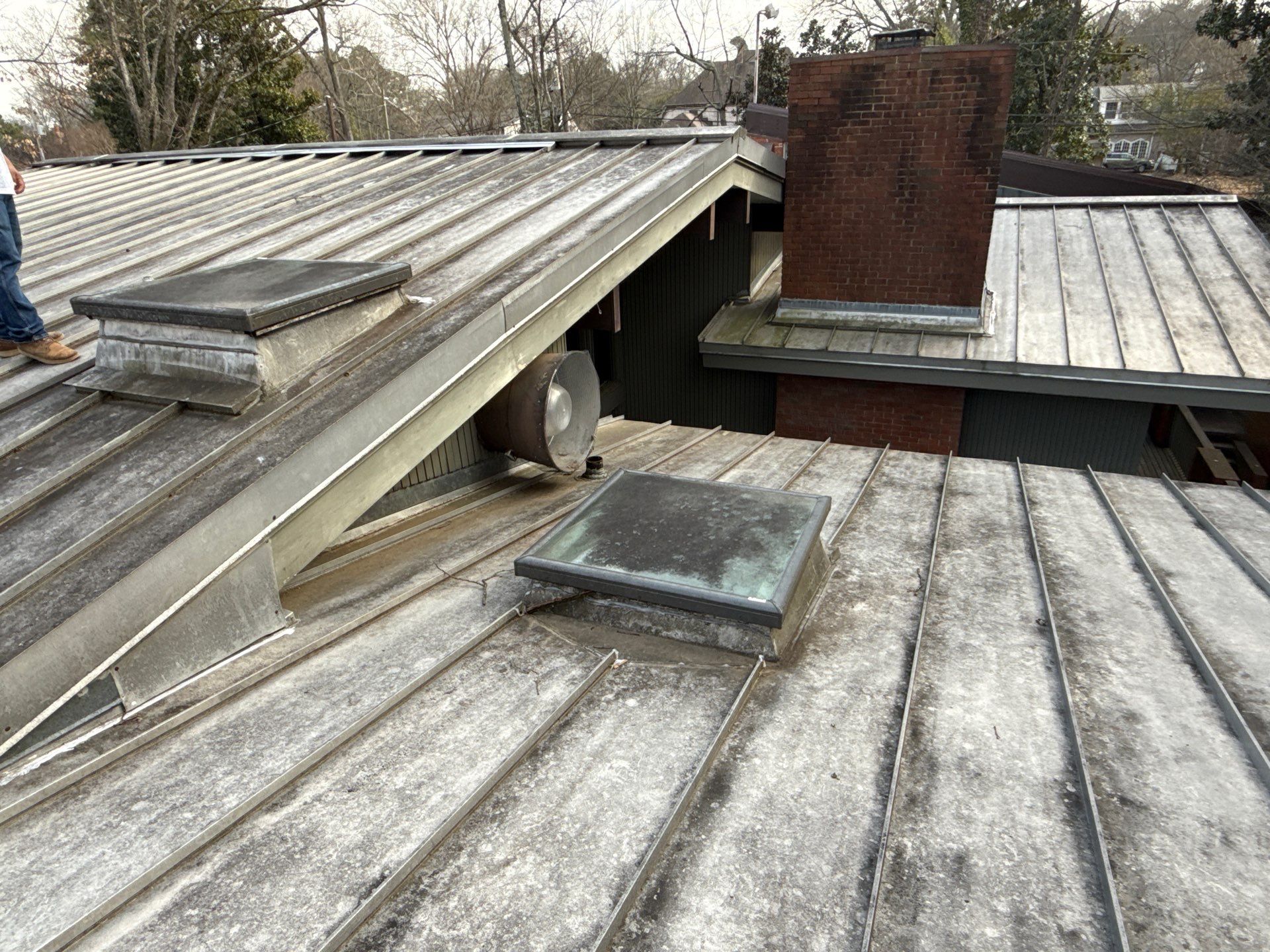 Residential Standing Seam Metal Roof and Membrane Replacement in Memphis by Revival Roofing Services