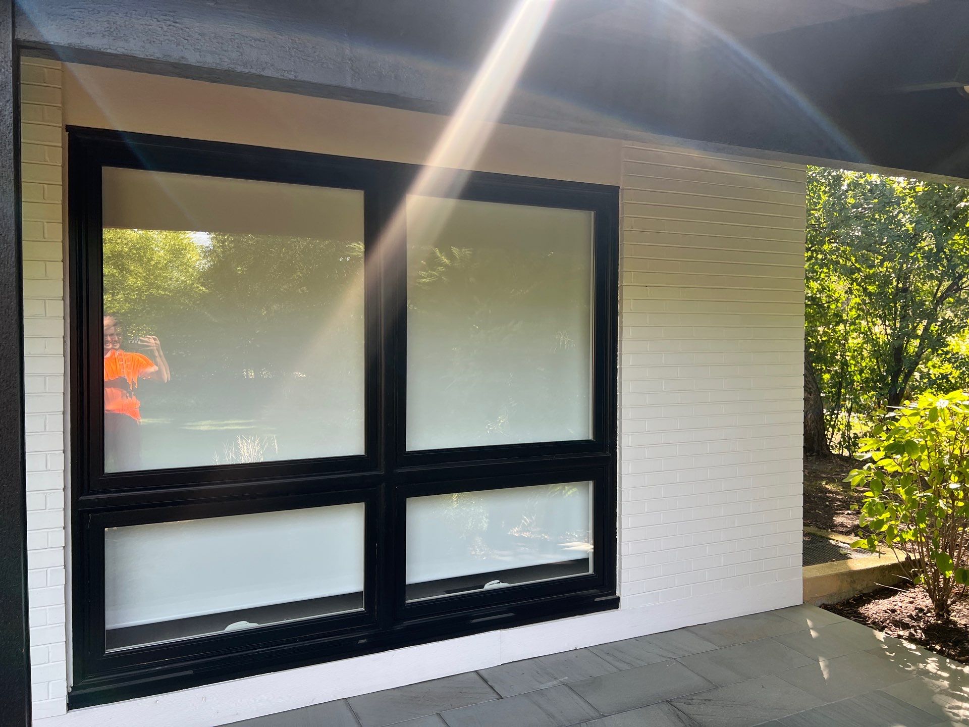 Complete Exterior House, Bluestone & Garage Floor Cleaning by Northern Power Washing LLC.