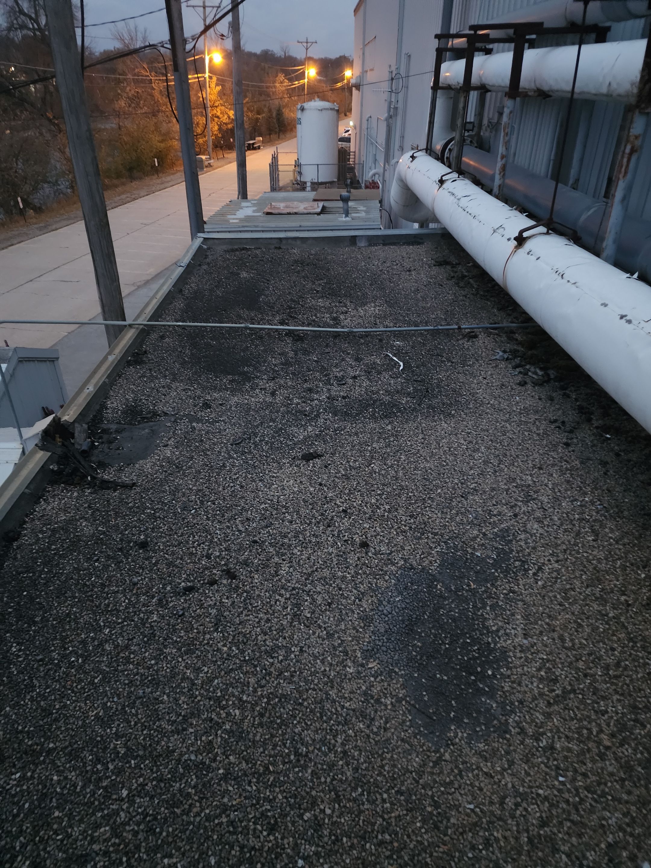 AML Riverside  by Grell Roofing, LLC