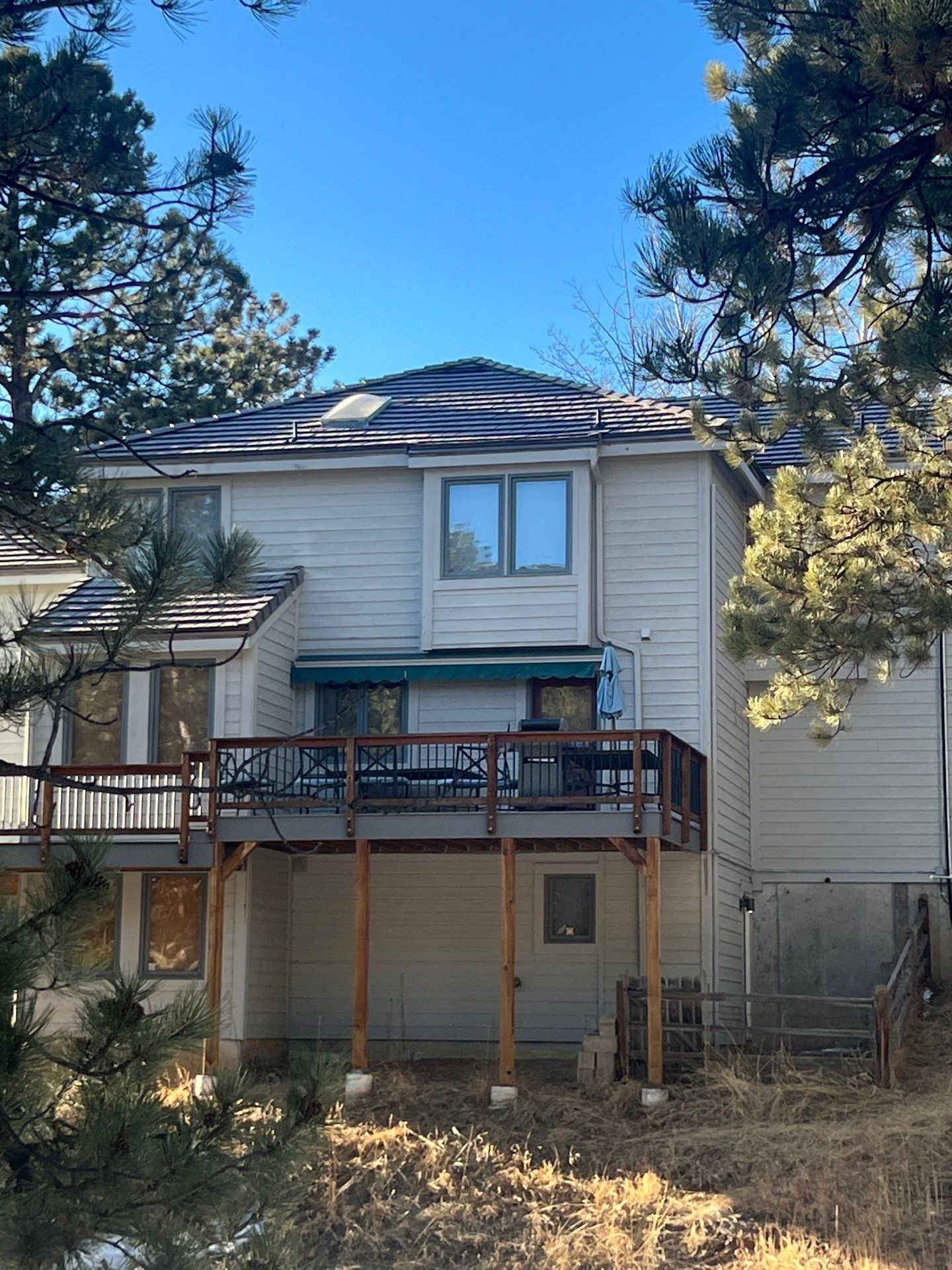 Residential Roofing Installation using Concrete Tile by Blue Peaks Roofing LLC 