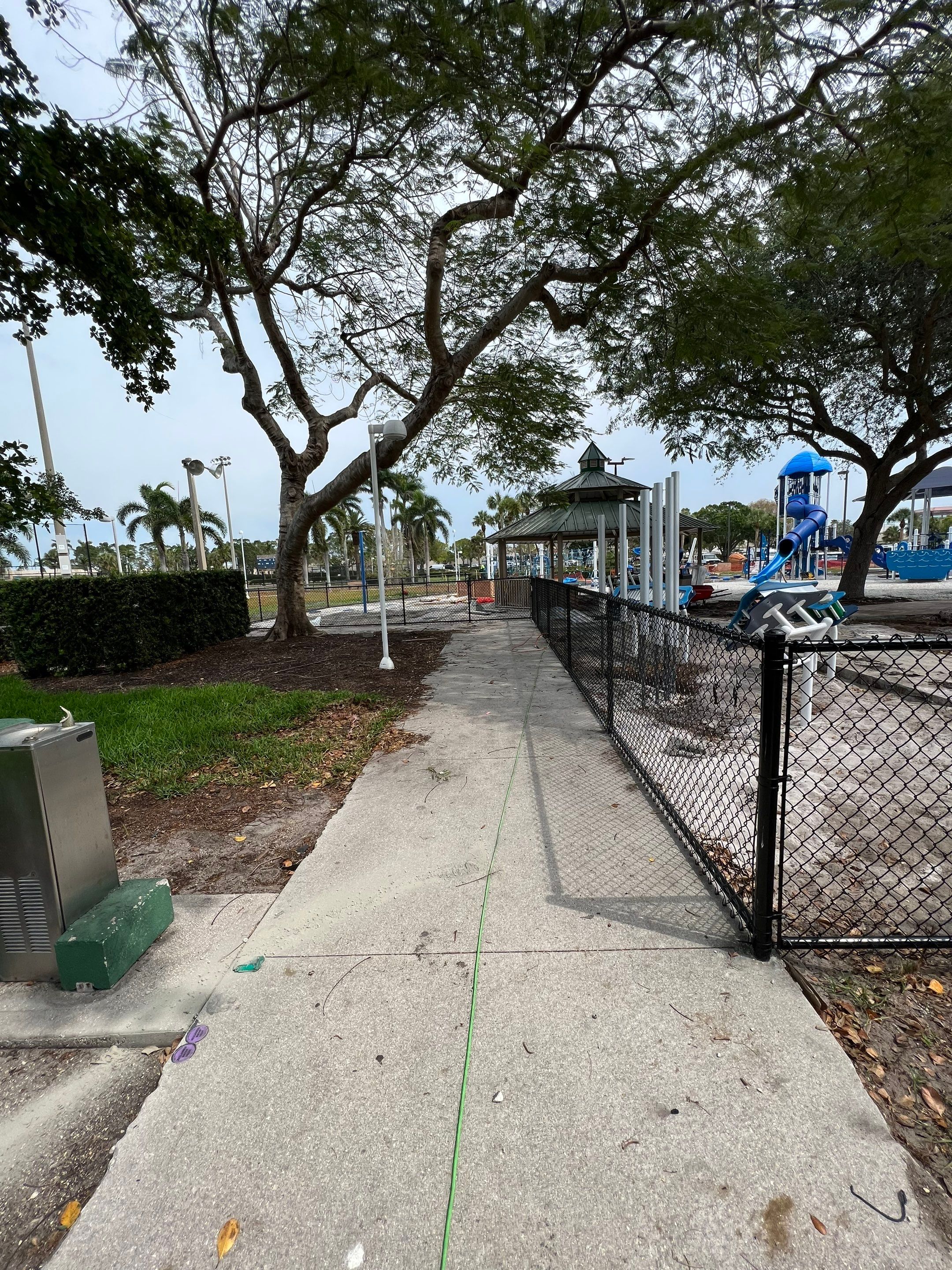 Vinyl Coated Chain-link fence for the City of Naples around Fleischmann Park Playground.  by Asap fence and gates, LLC