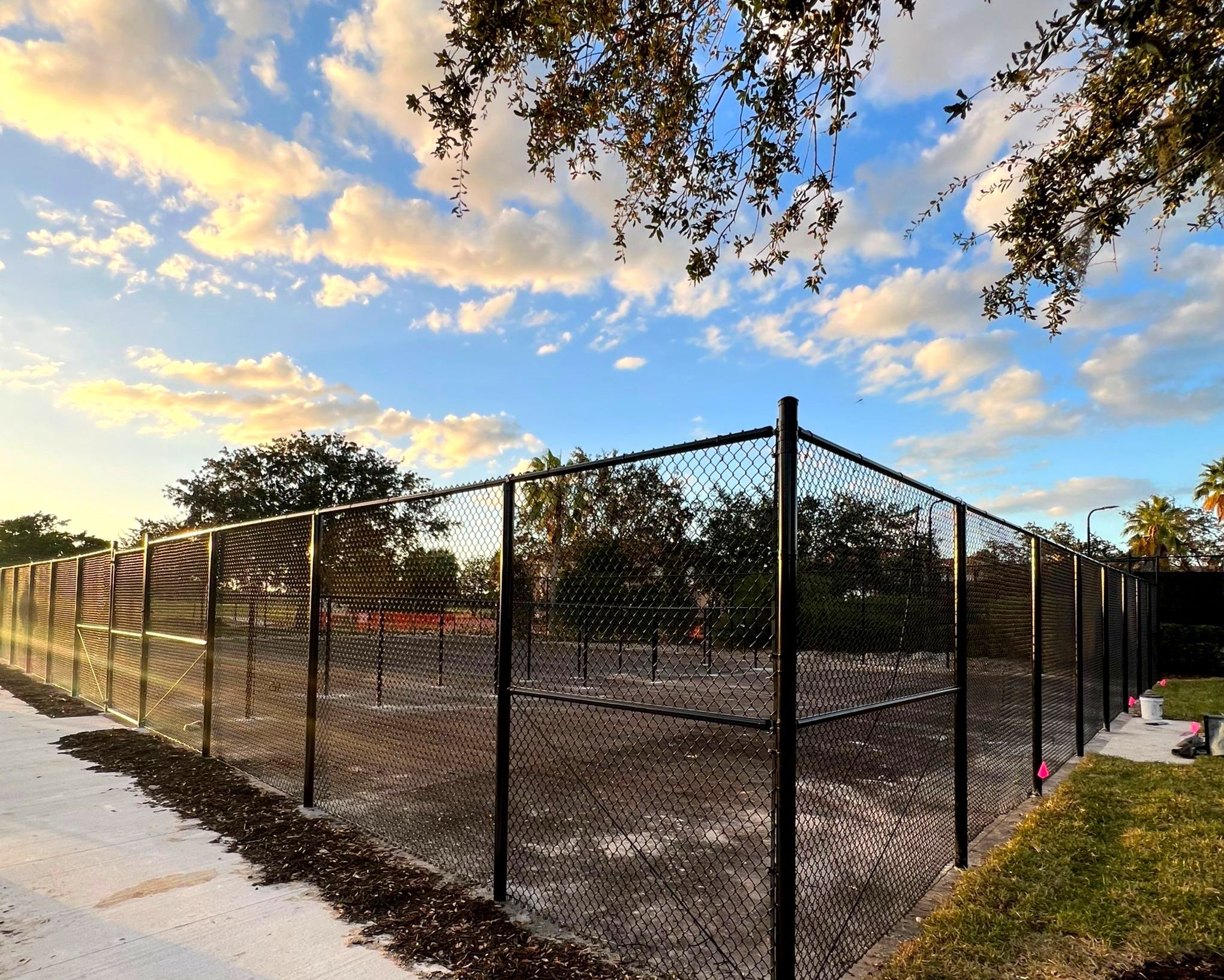Chain-link Fence Installation using 8Ft Tall Black Chainlink Fence by Asap fence and gates, LLC