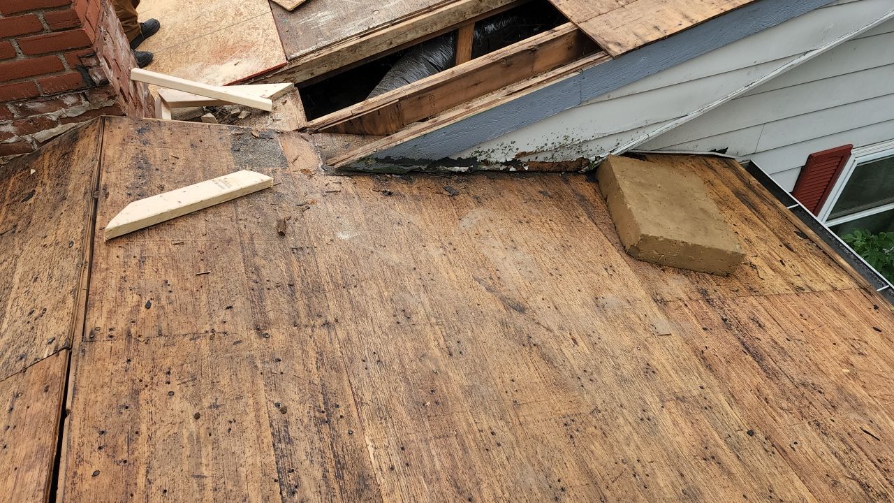 Residential Roofing Installation using 60 mil rubber roof  by Nitro Roofing and Construction
