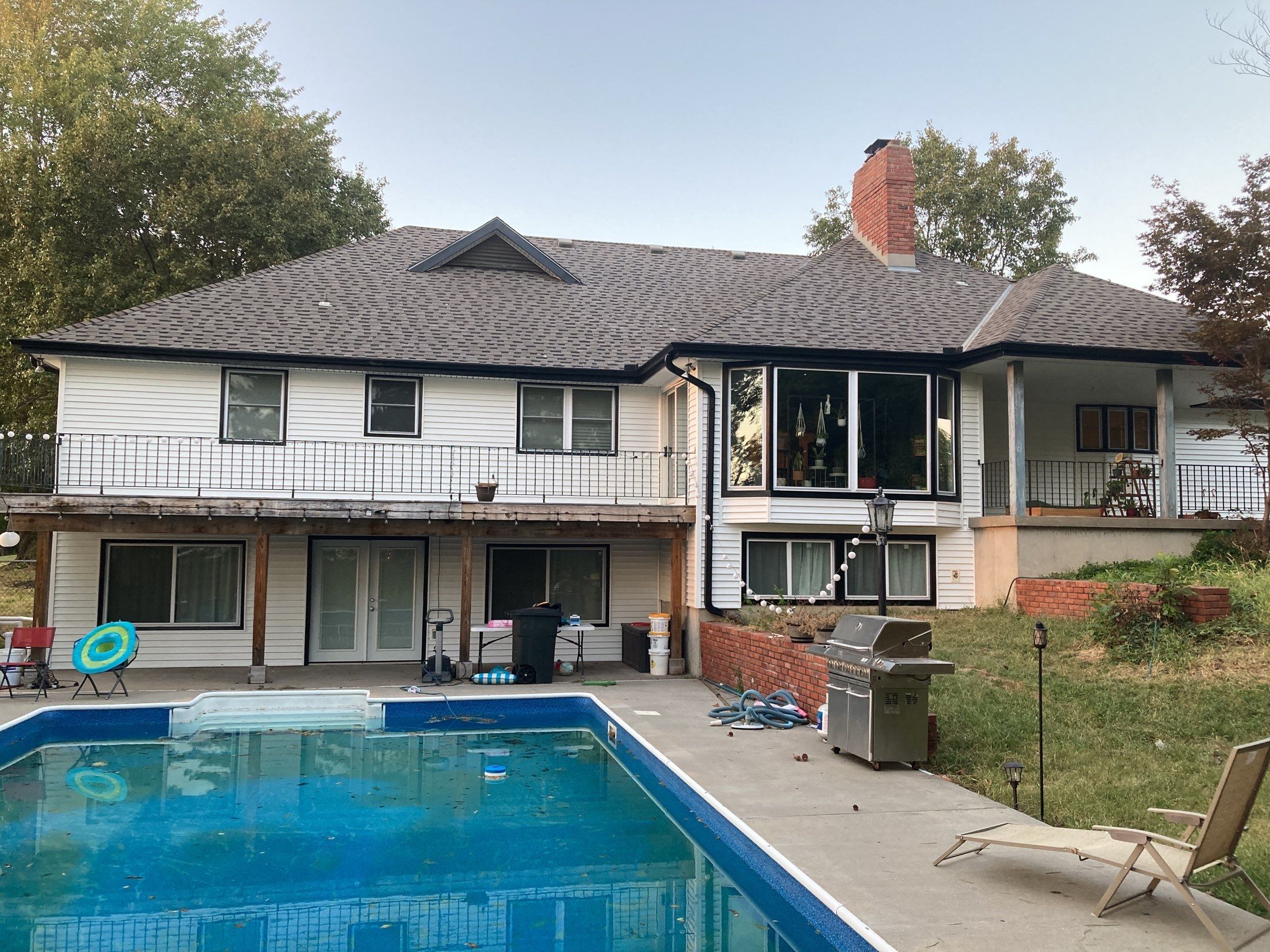 New white siding with Black trim by EEC  Windows, Siding & Roofing 