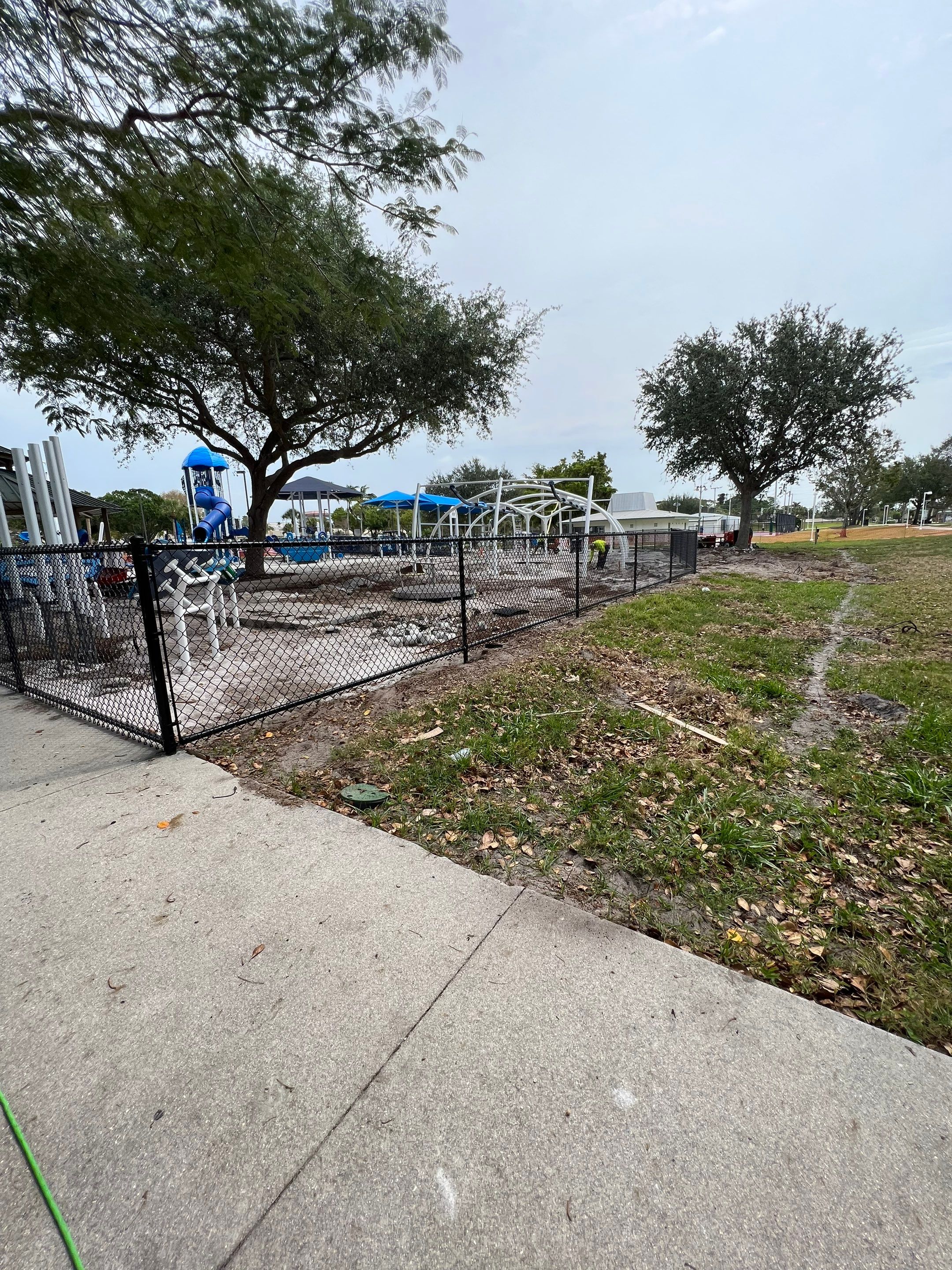Vinyl Coated Chain-link fence for the City of Naples around Fleischmann Park Playground.  by Asap fence and gates, LLC