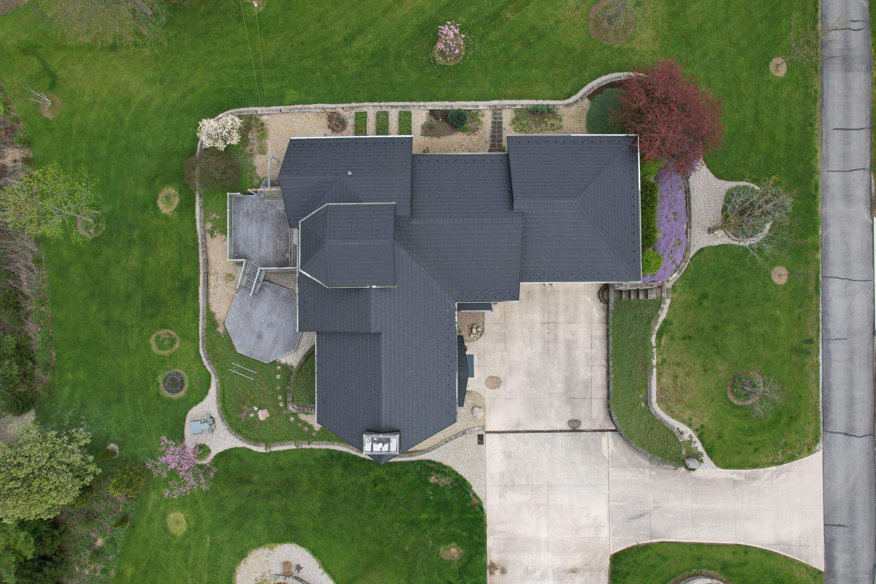 Residential Roofing Installation using Vic West Nothridge Slate by 4Ever Metal Roofing