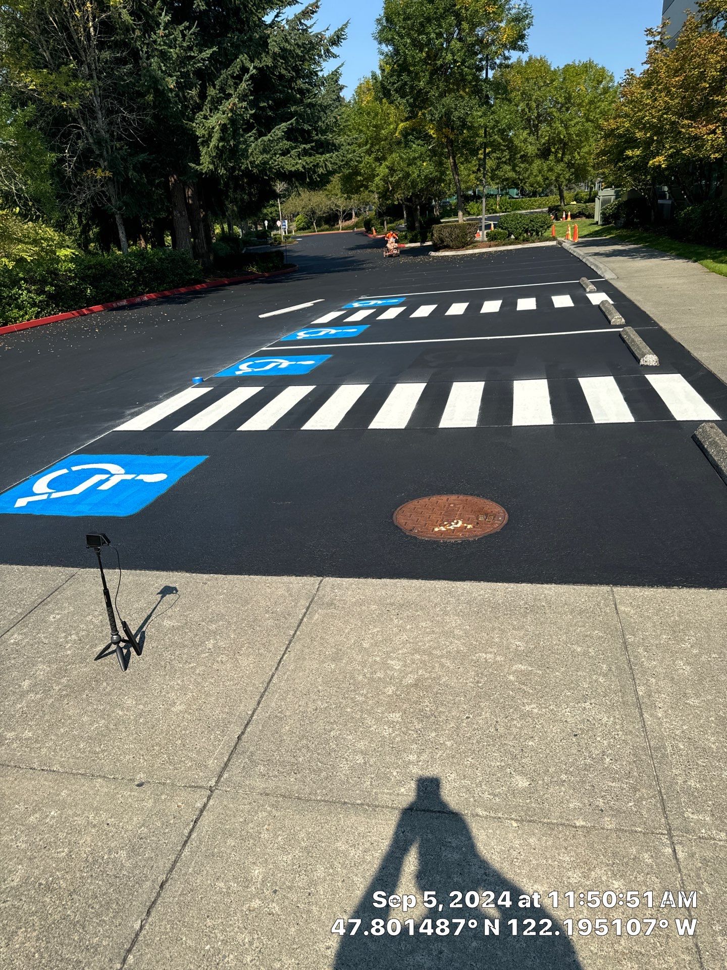 Kidder Matthews | Parking Lot Sealcoating & Striping with Concrete Curb & Patch Repairs  by Jireh Asphalt & Concrete Inc 