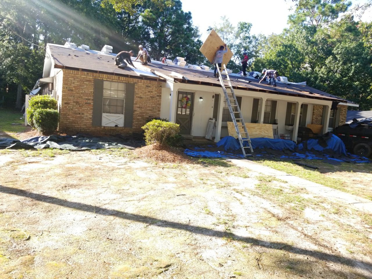 Residential Roofing Installation using Roof Replacement by American Roofing & Construction LLC