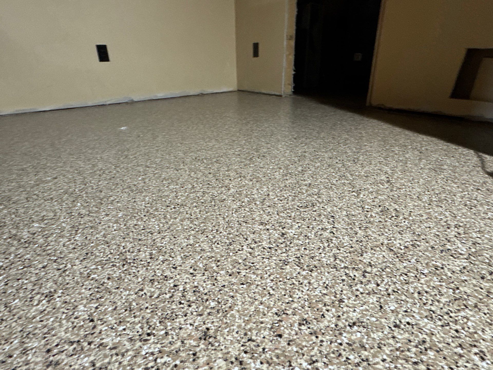 Garage and interior Project in Gainesville, FL in Sandstone by Cross Creek Concrete Coatings