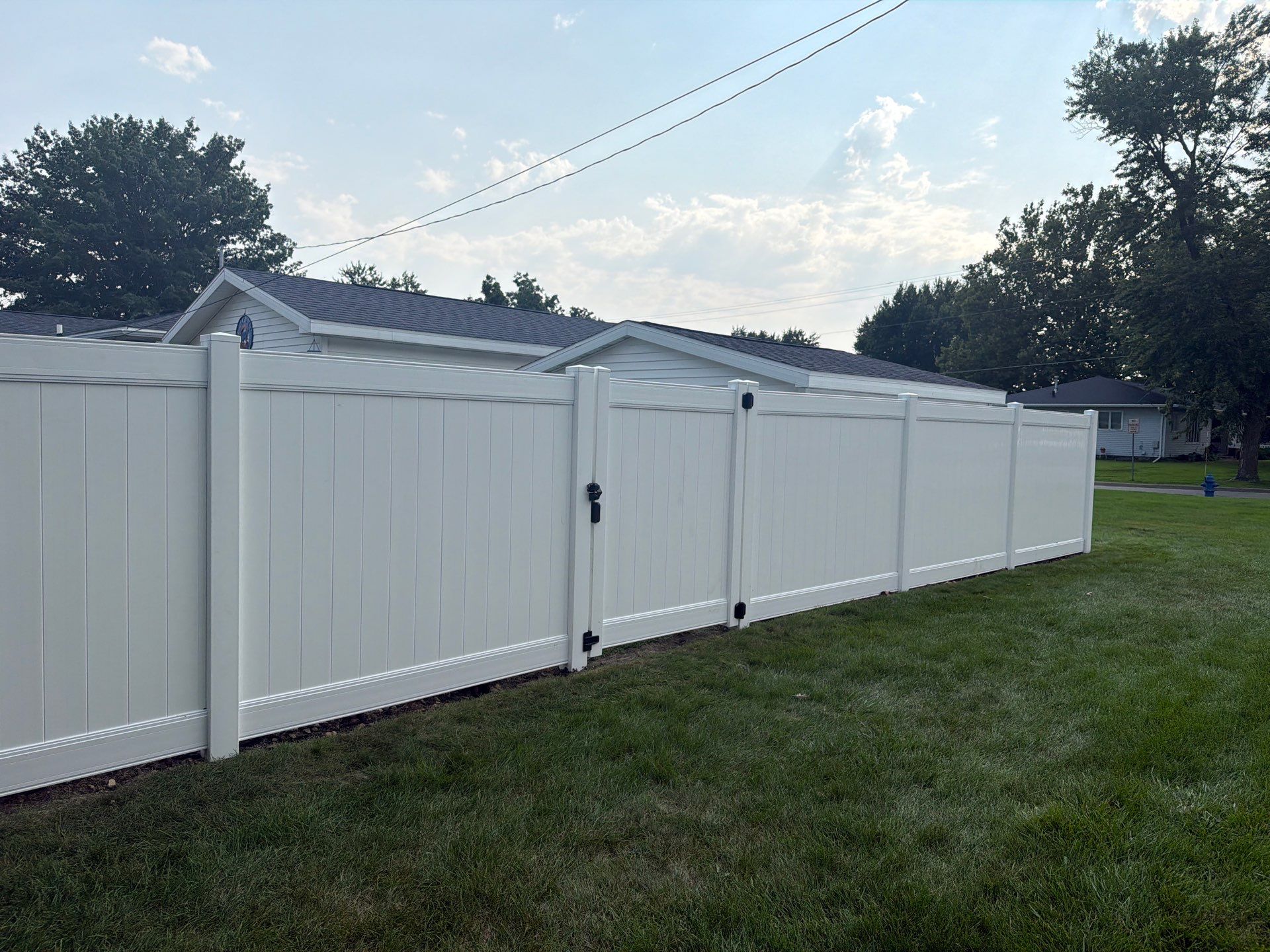 White Vinyl Privacy Fence Installation and Side Yard Upgrades in Waterloo by Perfect Picket Fence and Stain