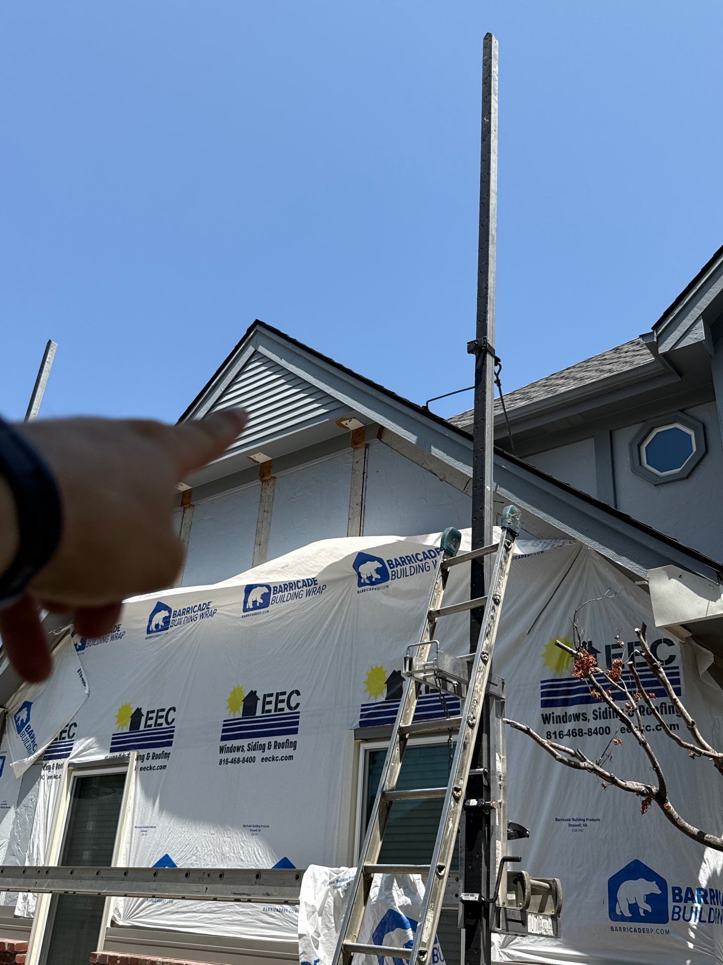 Whole Home Siding Replacement and Gutter Installation in Gladstone by EEC  Windows, Siding & Roofing 