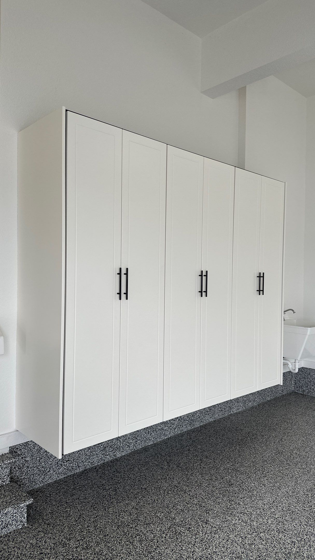 Mike & Pam transformed their garage with a Banner Garage Floor and Cabinets by Banner Garage