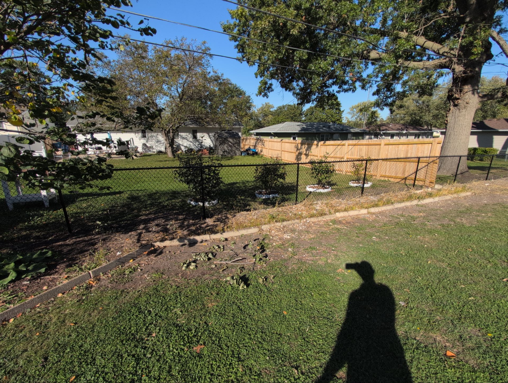 Black Chain Link Fence Installation for Waterloo Residential Property by Perfect Picket Fence and Stain