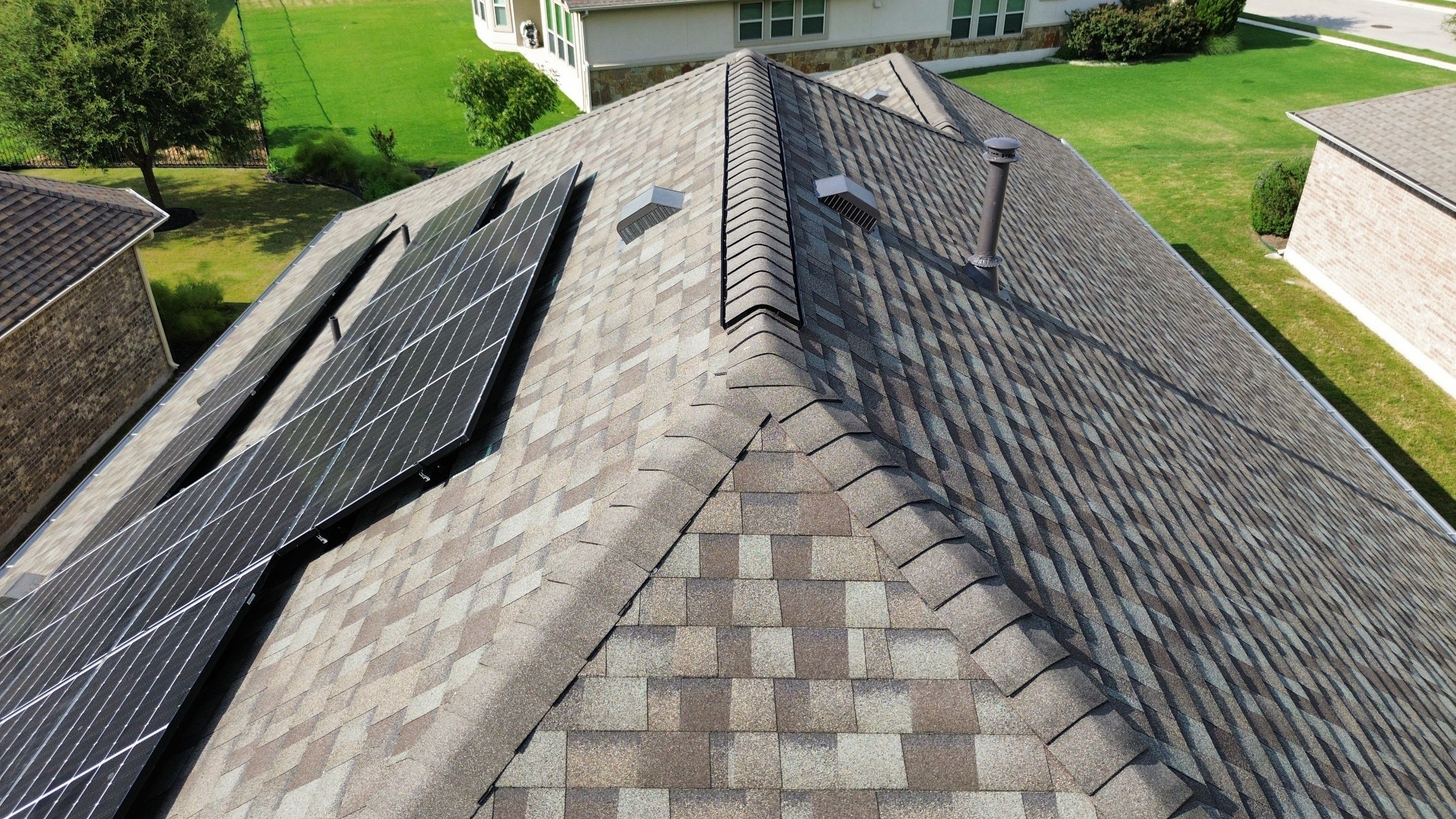 Full Roof Replacement with Solar Reinstall – Duration Driftwood | Round Rock, TX by Kstylez Roofing & Construction