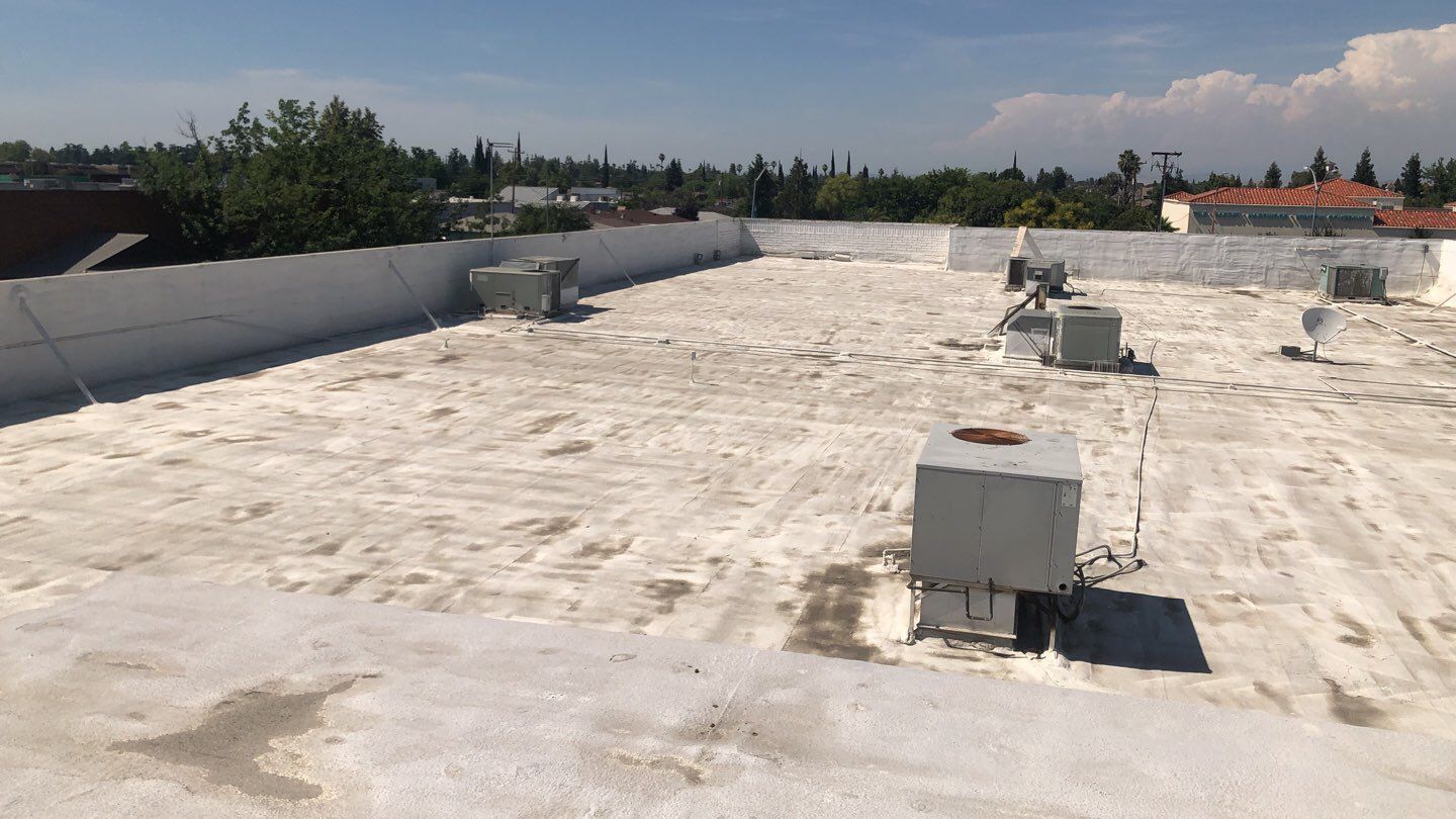 Reburbish existing spray foam job by Straight Edge Roofing Inc