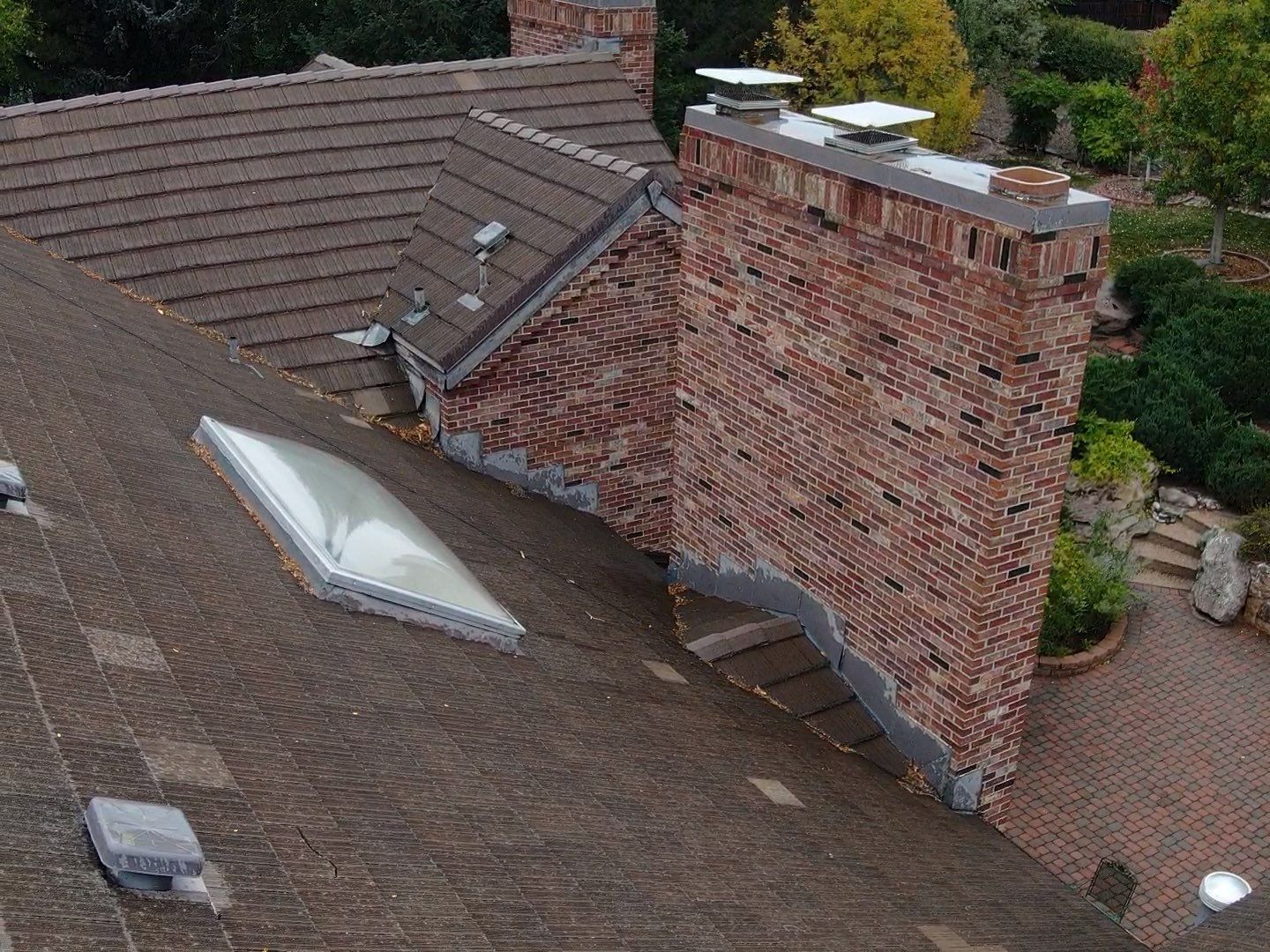 Unified Stone Coated Roof & Stucco Remodle by Blue Peaks Roofing LLC